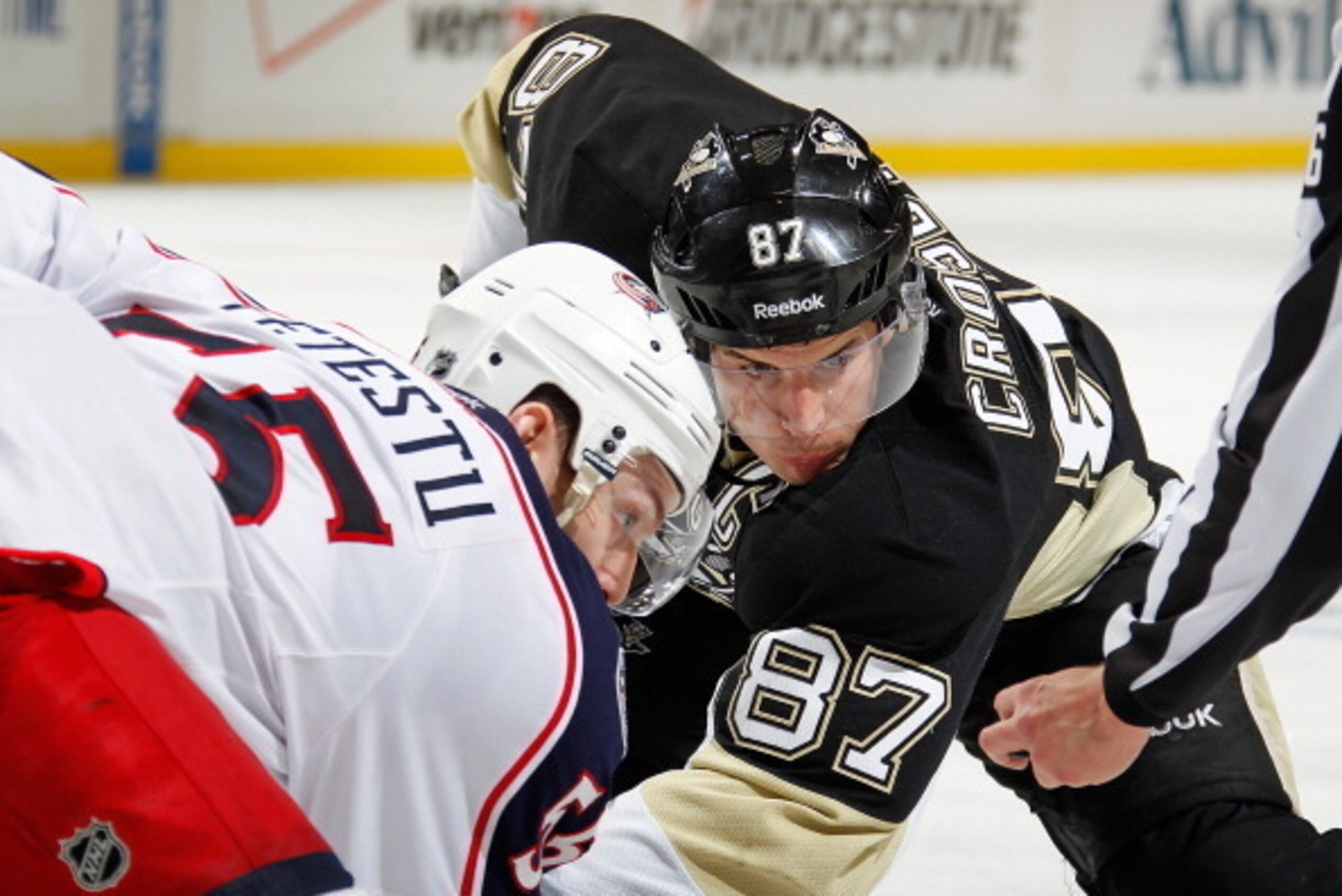 PITTSBURGH, PA - APRIL 19:  Sidney Crosby #87 of the Pittsburgh Penguins lines up for a face-off against Mark Letestu #55 of the Columbus Blue Jackets in Game Two of the First Round of the 2014 Stanley Cup Playoffs at Consol Energy Center on April 19, 201