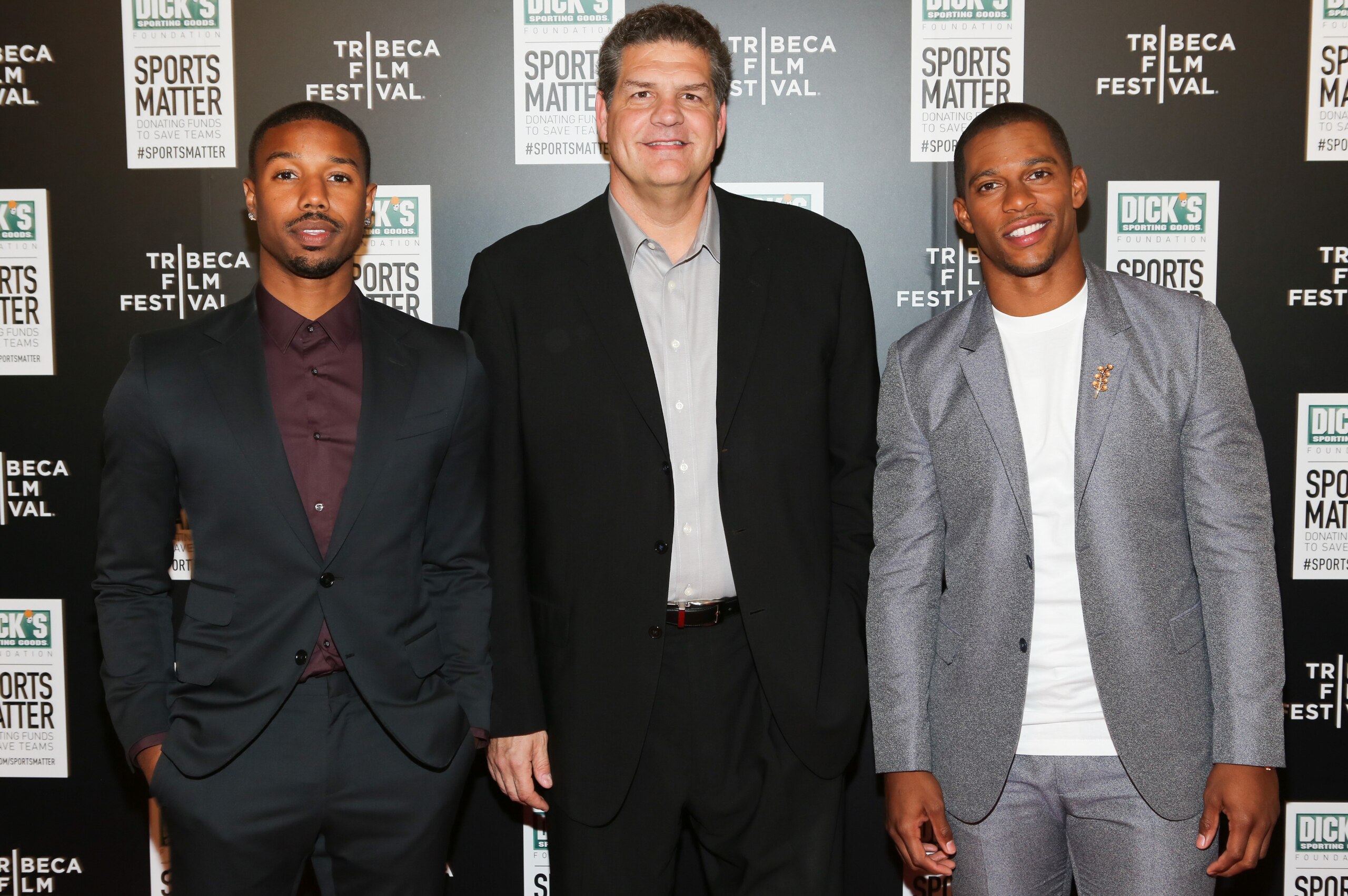 Cruz with actor Michael B. Jordan and broadcaster Mike Golic at the premiere of We Could Be King.