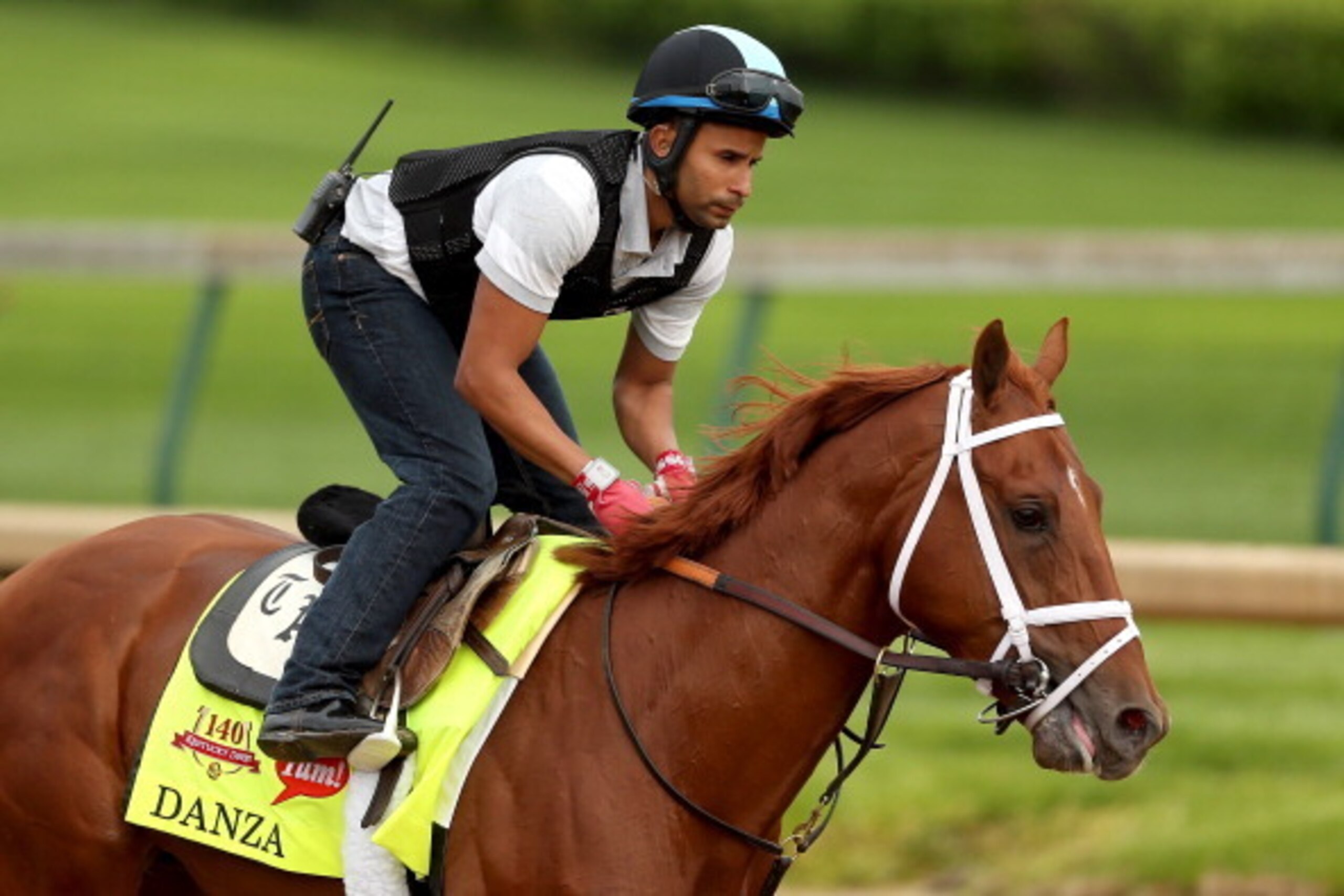 LOUISVILLE, KY - APRIL 25:  Danza is riden by Ezekiel Perez during the morning exercise session in preparation for the 140th Kentucky Derby at Churchill Downs on April 25, 2014 in Louisville, Kentucky.  (Photo by Matthew Stockman/Getty Images)