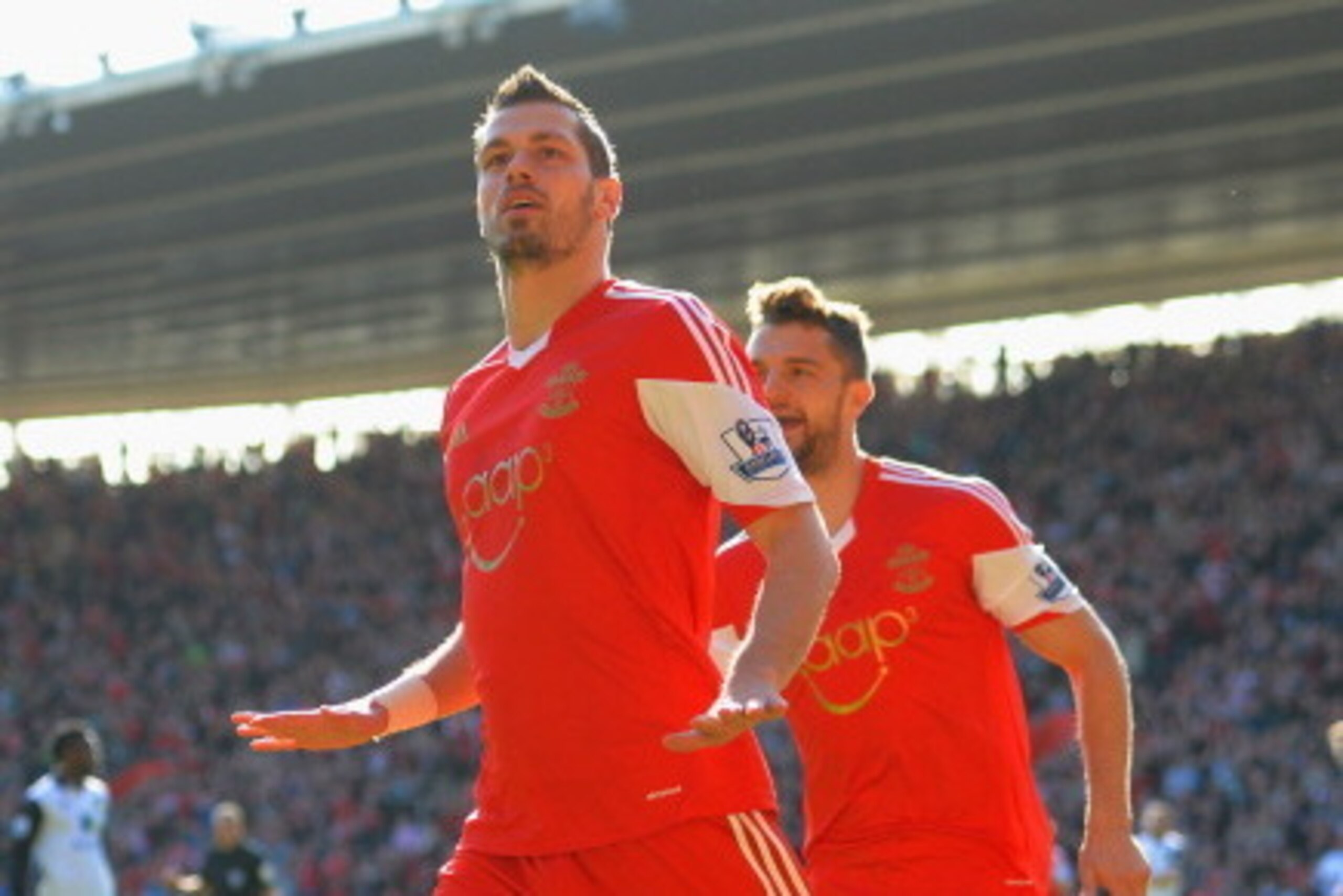 SOUTHAMPTON, ENGLAND - MARCH 15:  Morgan Schneiderlin of Southampton celebrates scoring the opening goal with Jay Rodriguez of Southampton during the Barclays Premier League match between Southampton and Norwich City at St Mary's Stadium on March 15, 2014