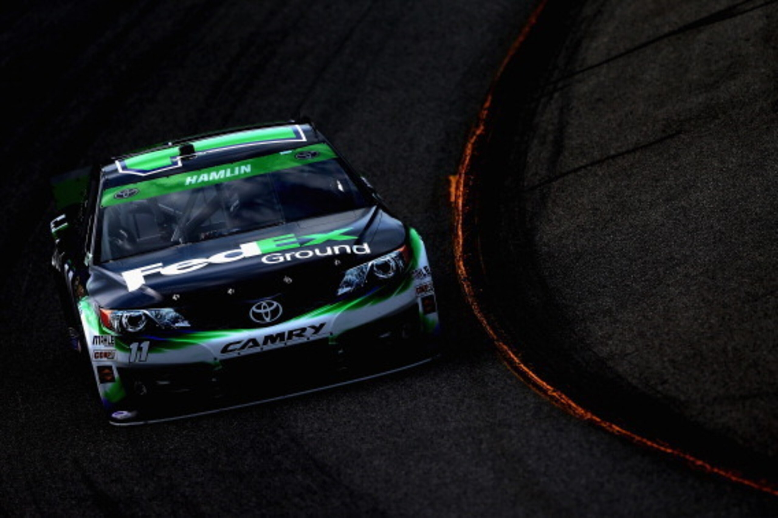 RICHMOND, VA - APRIL 25:  Denny Hamlin, driver of the #11 FedEx Ground Toyota, practices for the NASCAR Sprint Cup Series Toyota Owners 400 at Richmond International Raceway on April 25, 2014 in Richmond, Virginia.  (Photo by Sean Gardner/Getty Images)