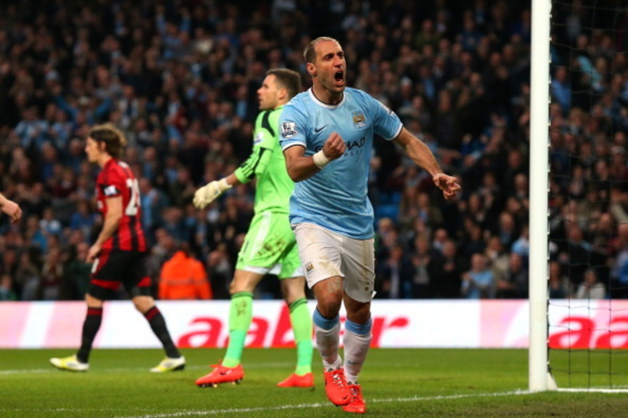 MANCHESTER, ENGLAND - APRIL 21:  Pablo Zabaleta of Manchester City celebrates after scoring the opening goal during the Barclays Premier League match between Manchester City and West Bromwich Albion at Etihad Stadium on April 21, 2014 in Manchester, Engla