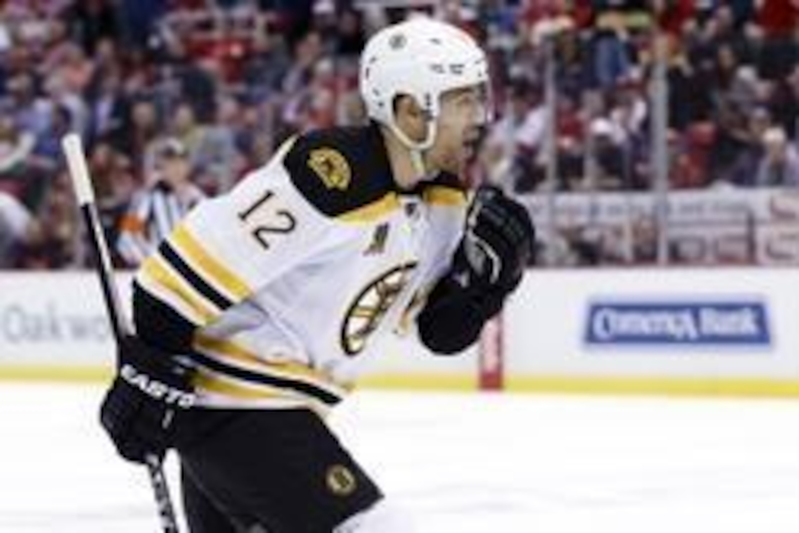 Apr 24, 2014; Detroit, MI, USA; Boston Bruins right wing Jarome Iginla (12) celebrates his overtime goal against the Detroit Red Wings in game four of the first round of the 2014 Stanley Cup Playoffs at Joe Louis Arena. Boston won 3-2 in overtime. Mandat Apr 24, 2014; Detroit, MI, USA; Boston Bruins right wing Jarome Iginla (12) celebrates his overtime goal against the Detroit Red Wings in game four of the first round of the 2014 Stanley Cup Playoffs at Joe Louis Arena. Boston won 3-2 in overtime. Mandat