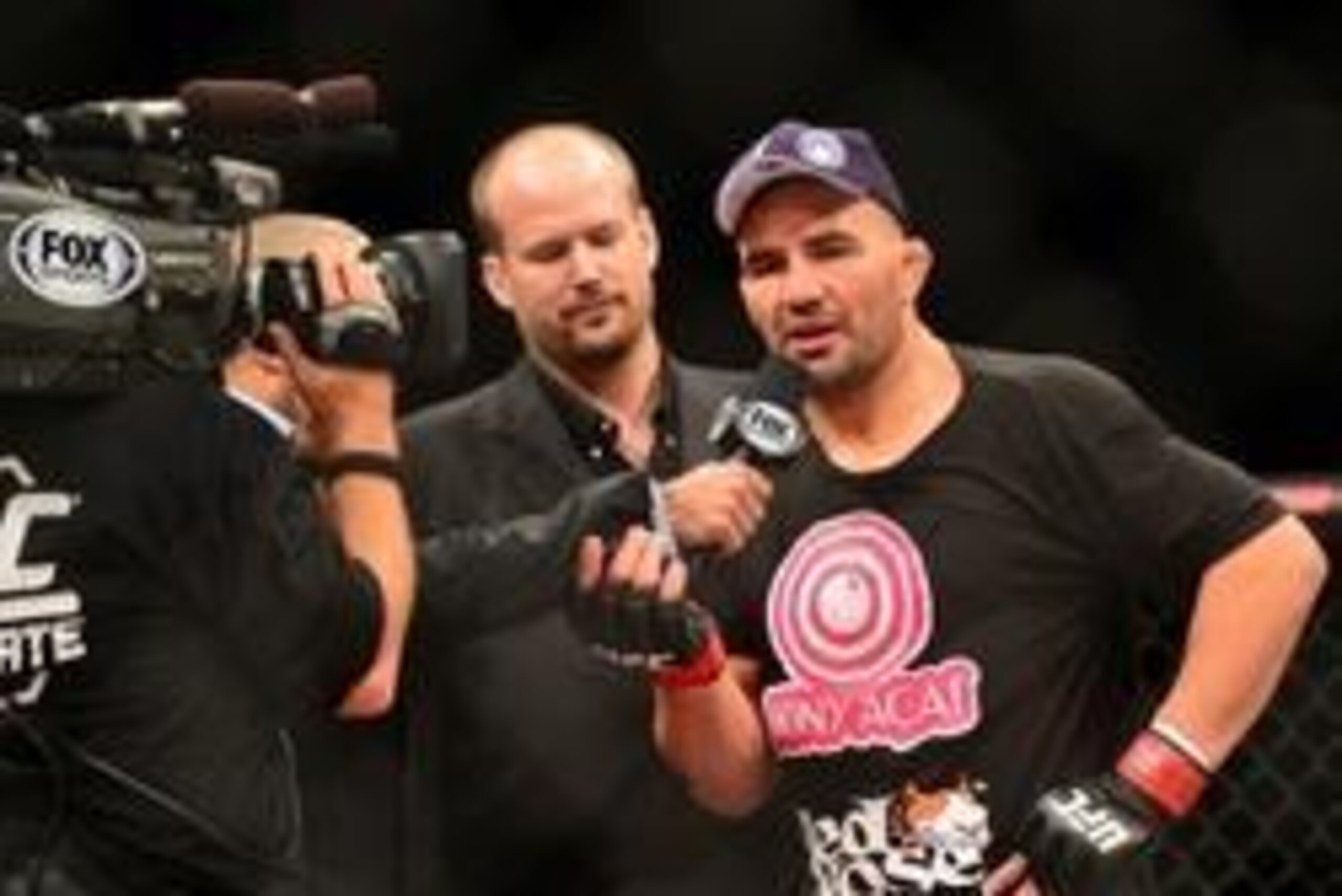 Sep 4, 2013; Belo Horizonte, BRAZIL; Glover Teixeira celebrates defeating Ryan Bader (not pictured) during UFC Fight Night at Mineirinho Arena. Mandatory Credit: Jason Silva-USA TODAY Sports