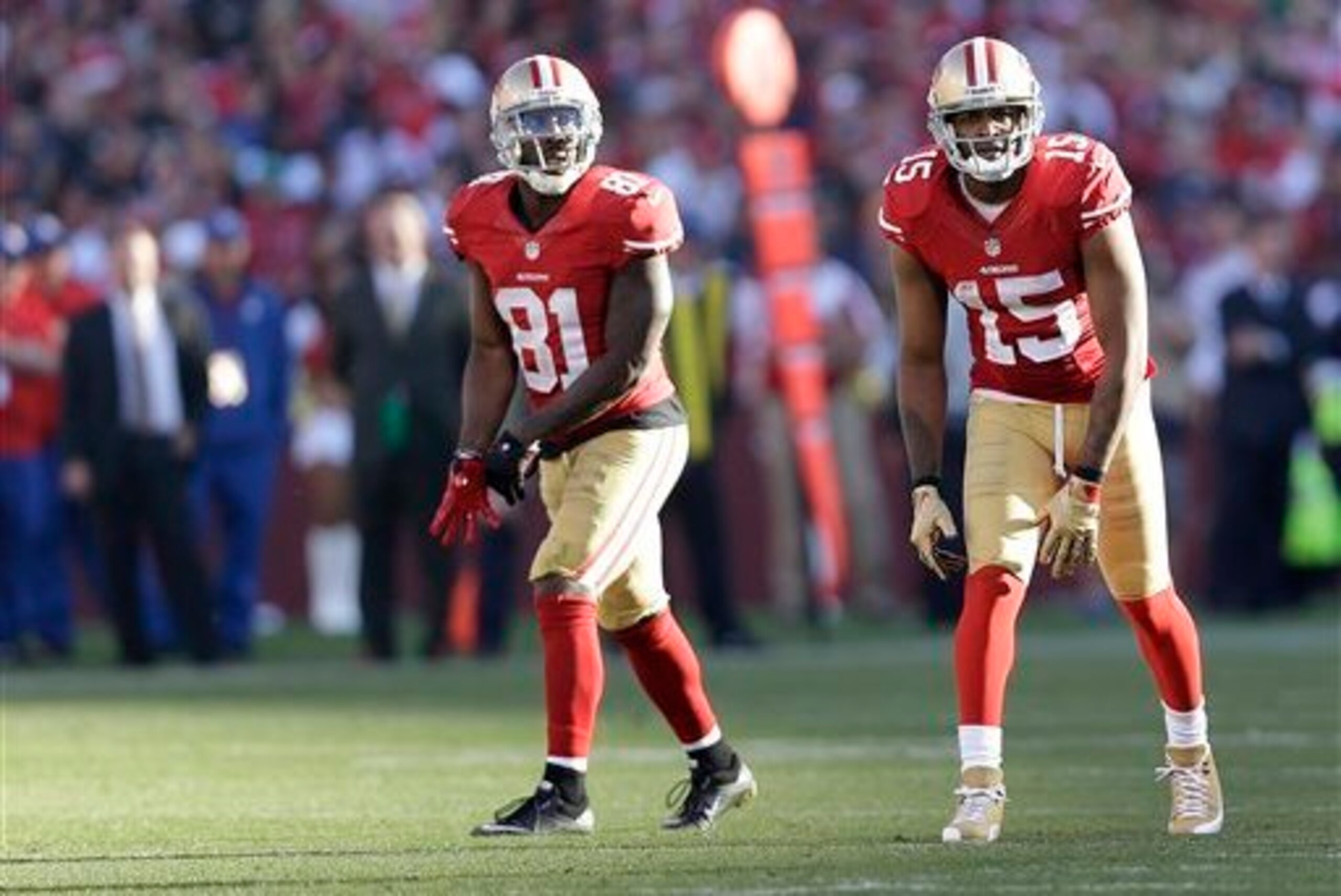 Rice feels that 49ers receivers like Anquan Boldin (left) and Michael Crabtree (right) would benefit from a speedy playmaker.