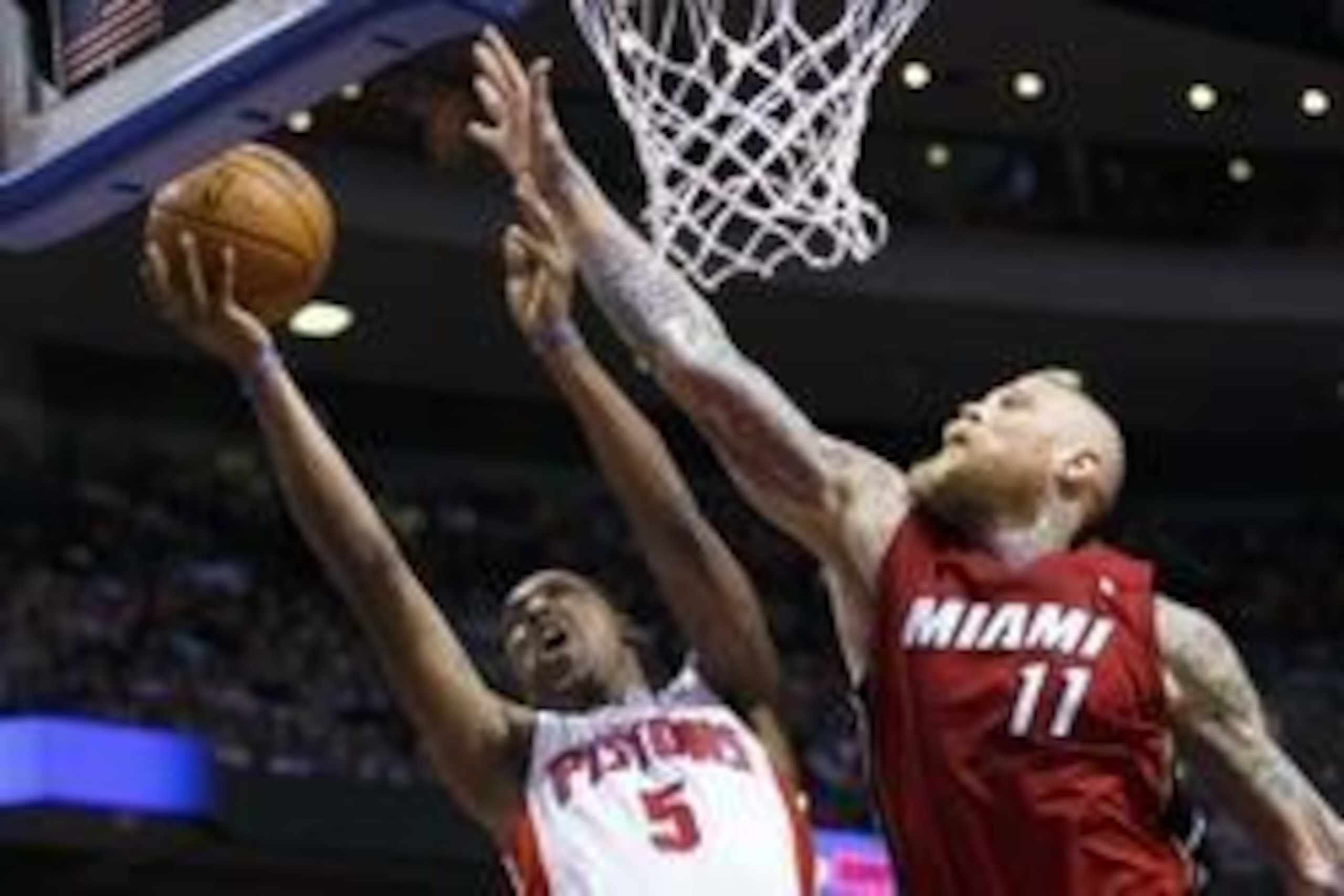 Mar 28, 2014; Auburn Hills, MI, USA; Detroit Pistons guard Kentavious Caldwell-Pope (5) shoots on Miami Heat forward Chris Andersen (11) in the fourth quarter at The Palace of Auburn Hills. Miami won 110-78. Mandatory Credit: Rick Osentoski-USA TODAY Spor