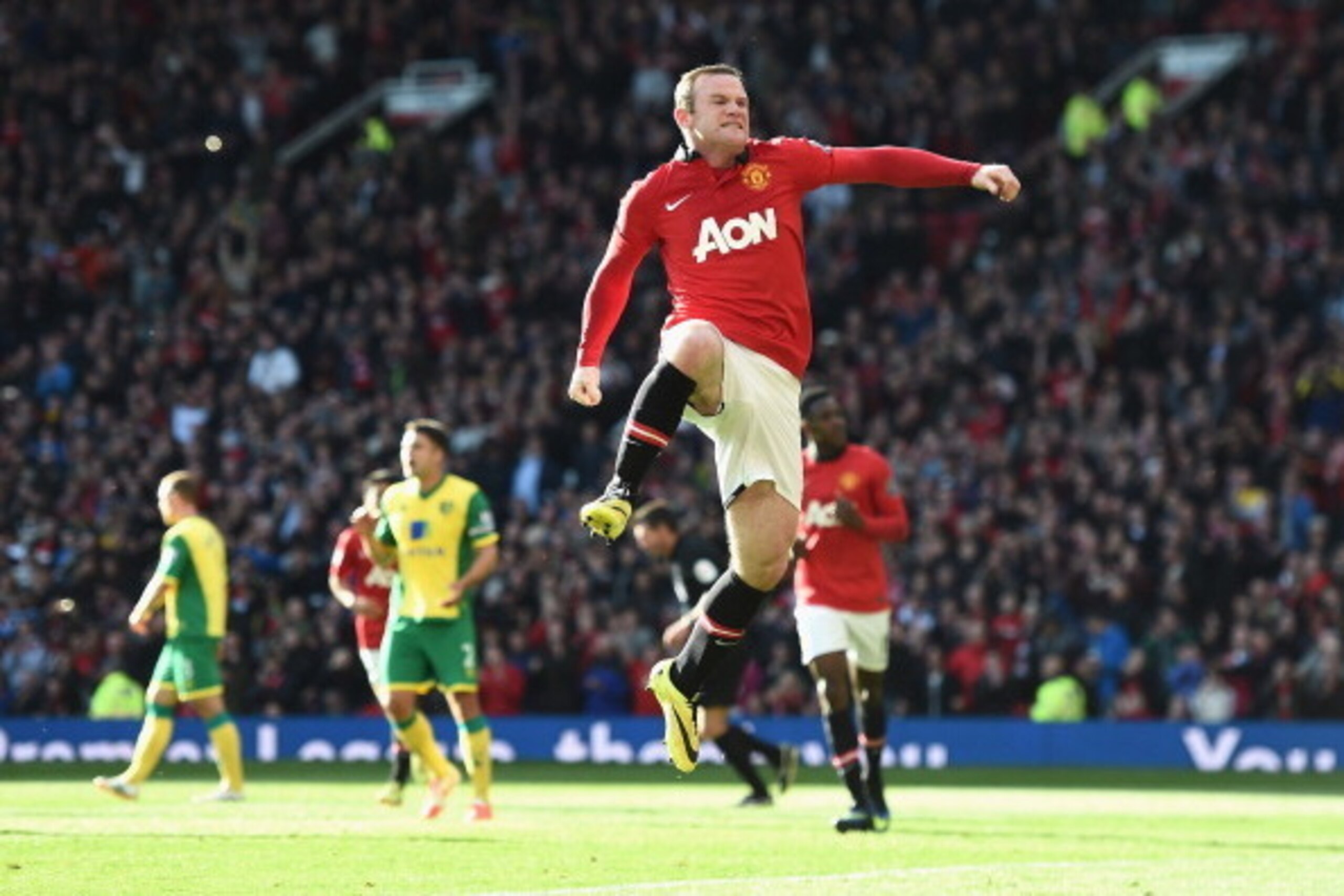 MANCHESTER, ENGLAND - APRIL 26: Wayne Rooney of Manchester United celebrates his first half penalty during the Barclays Premier League match between Manchester United and Norwich City at Old Trafford on April 26, 2014 in Manchester, England.  (Photo by La