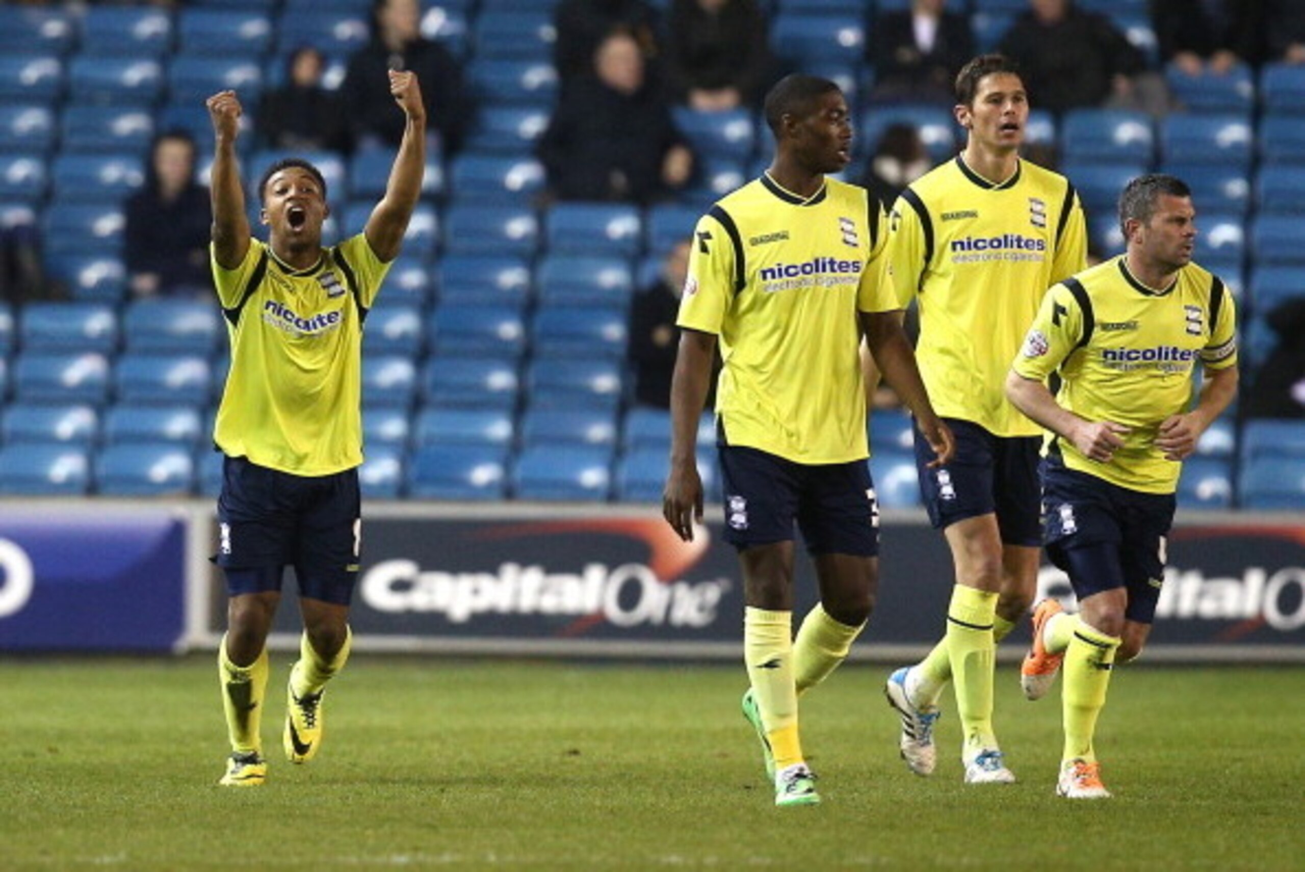 LONDON, ENGLAND - MARCH 25: Jordan Ibe of Birmingham (L) celebrates after scoring this team's first goal during the Sky Bet Championship match between Millwall and Birmingham City at The Den on March 25, 2014 in London, England. (Photo by Charlie Crowhurs