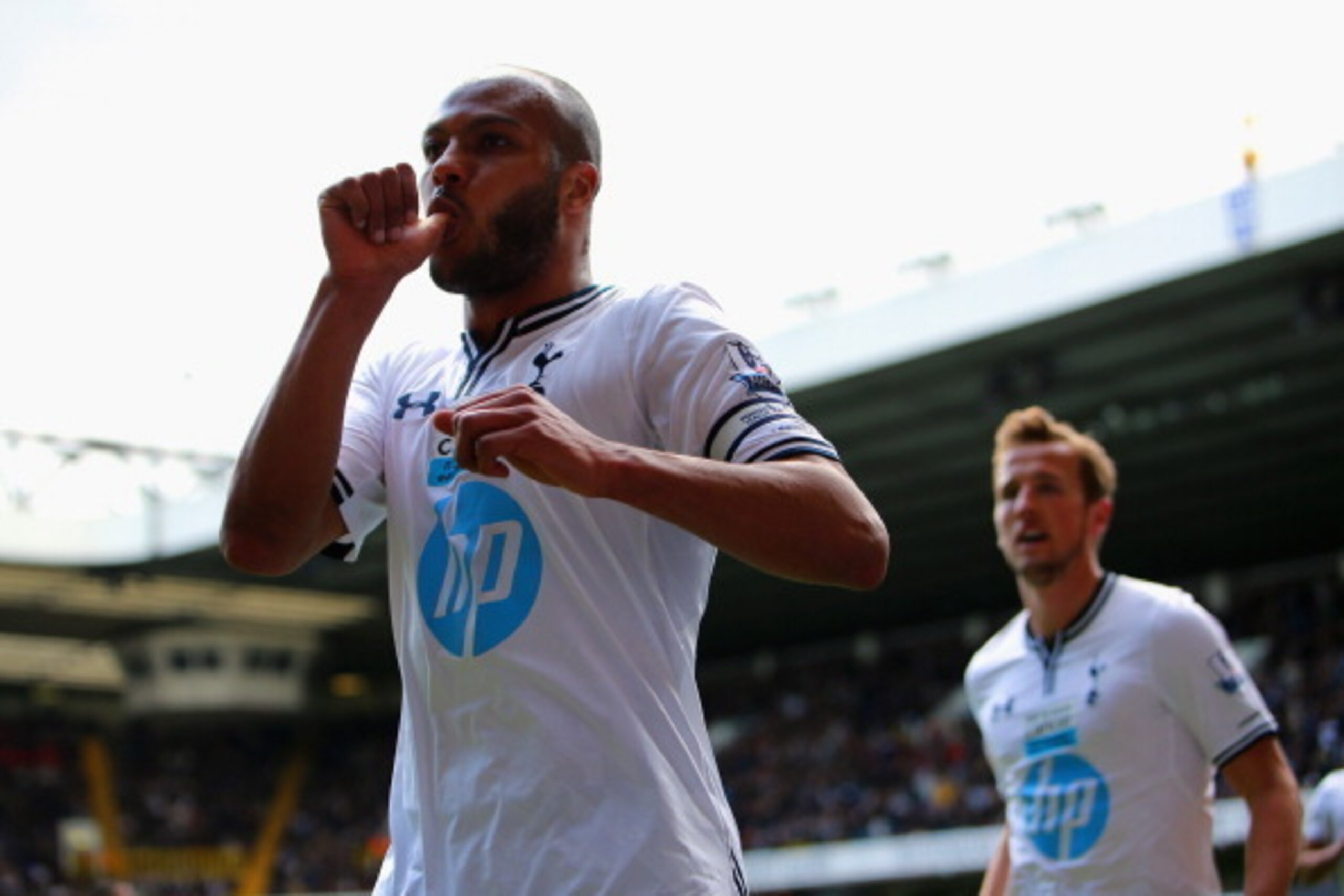 LONDON, ENGLAND - APRIL 19:  Younes Kaboul of Tottenham Hotspur celebrates scoring their third goal during the Barclays Premier League match between Tottenham Hotspur and Fulham at White Hart Lane on April 19, 2014 in London, England.  (Photo by Clive Ros