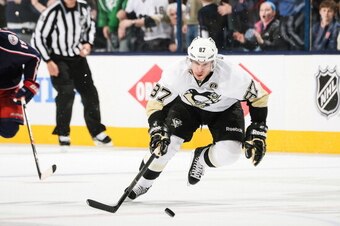COLUMBUS, OH - APRIL 23:  Sidney Crosby #87 of the Pittsburgh Penguins skates with the puck against the Columbus Blue Jackets in Game Four of the First Round of the 2014 Stanley Cup Playoffs on April 23, 2014 at Nationwide Arena in Columbus, Ohio.  (Photo
