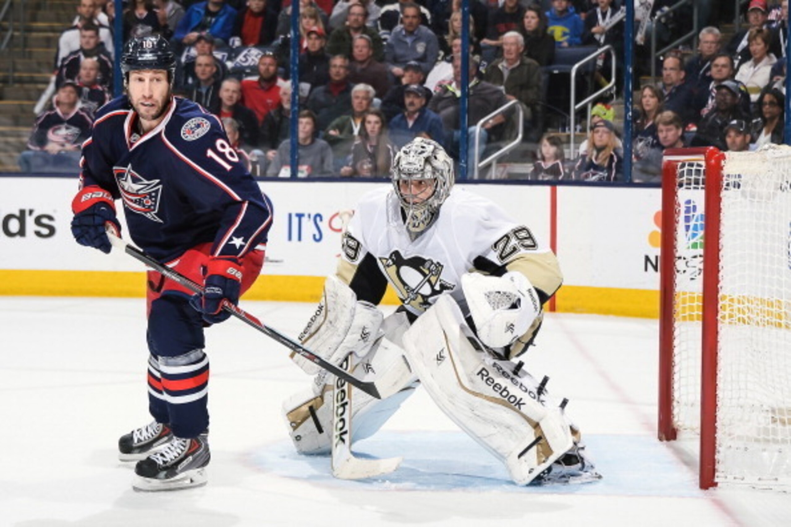 COLUMBUS, OH - APRIL 23:  R.J. Umberger #18 of the Columbus Blue Jackets skate in front of goaltender Marc-Andre Fleury #29 of the Pittsburgh Penguins in Game Four of the First Round of the 2014 Stanley Cup Playoffs on April 23, 2014 at Nationwide Arena i
