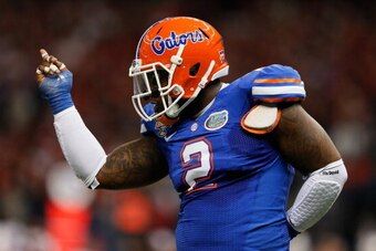 NEW ORLEANS, LA - JANUARY 02:  Dominique Easley #2 of the Florida Gators celebrates after sacking Teddy Bridgewater #5 of the Louisville Cardinals in the first quarter of the Allstate Sugar Bowl at Mercedes-Benz Superdome on January 2, 2013 in New Orleans