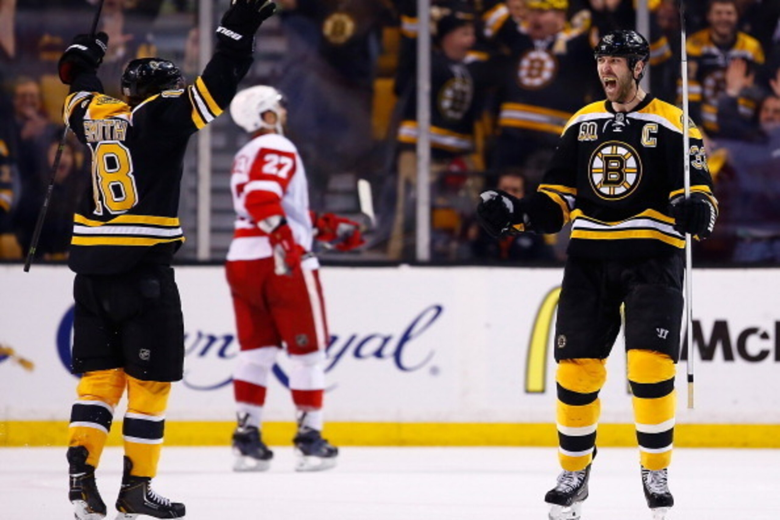 BOSTON, MA - APRIL 26: Zdeno Chara #33 of the Boston Bruins celebrates his goal at the end of the second period with teammate Reilly Smith #18 against the Detroit Red Wings in Game Five of the First Round of the 2014 NHL Stanley Cup Playoffs at TD Garden 