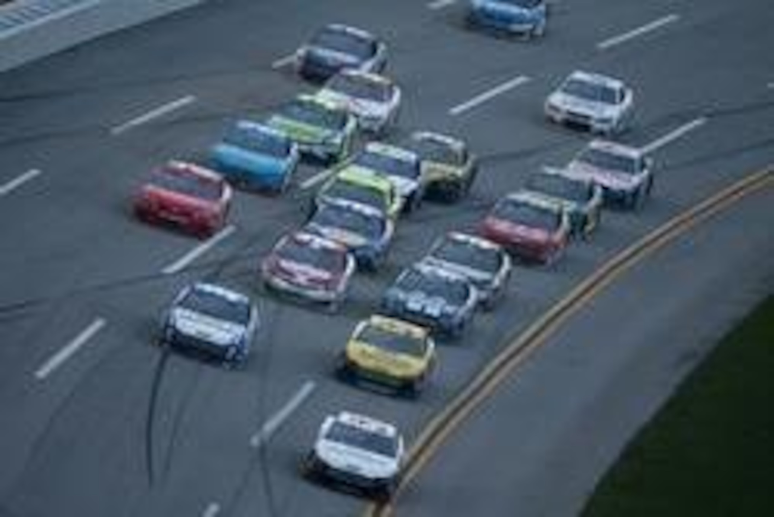 May 5, 2013; Talladega, AL, USA; NASCAR Sprint Cup Series driver David Ragan (34) leads David Gilliland (38) and Carl Edwards (99) to the checkered flag during the Aaron's 499 at Talladega Superspeedway. Mandatory Credit: Mark J. Rebilas-USA TODAY Sports