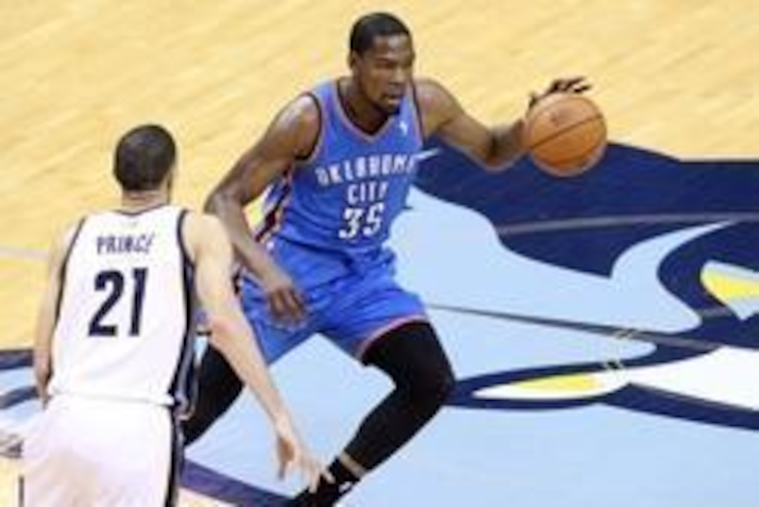 Apr 26, 2014; Memphis, TN, USA; Oklahoma City Thunder forward Kevin Durant (35) drives against Memphis Grizzlies forward Tayshaun Prince (35) during the first quarter in game four of the first round of the 2014 NBA Playoffs at FedExForum. Mandatory Credit