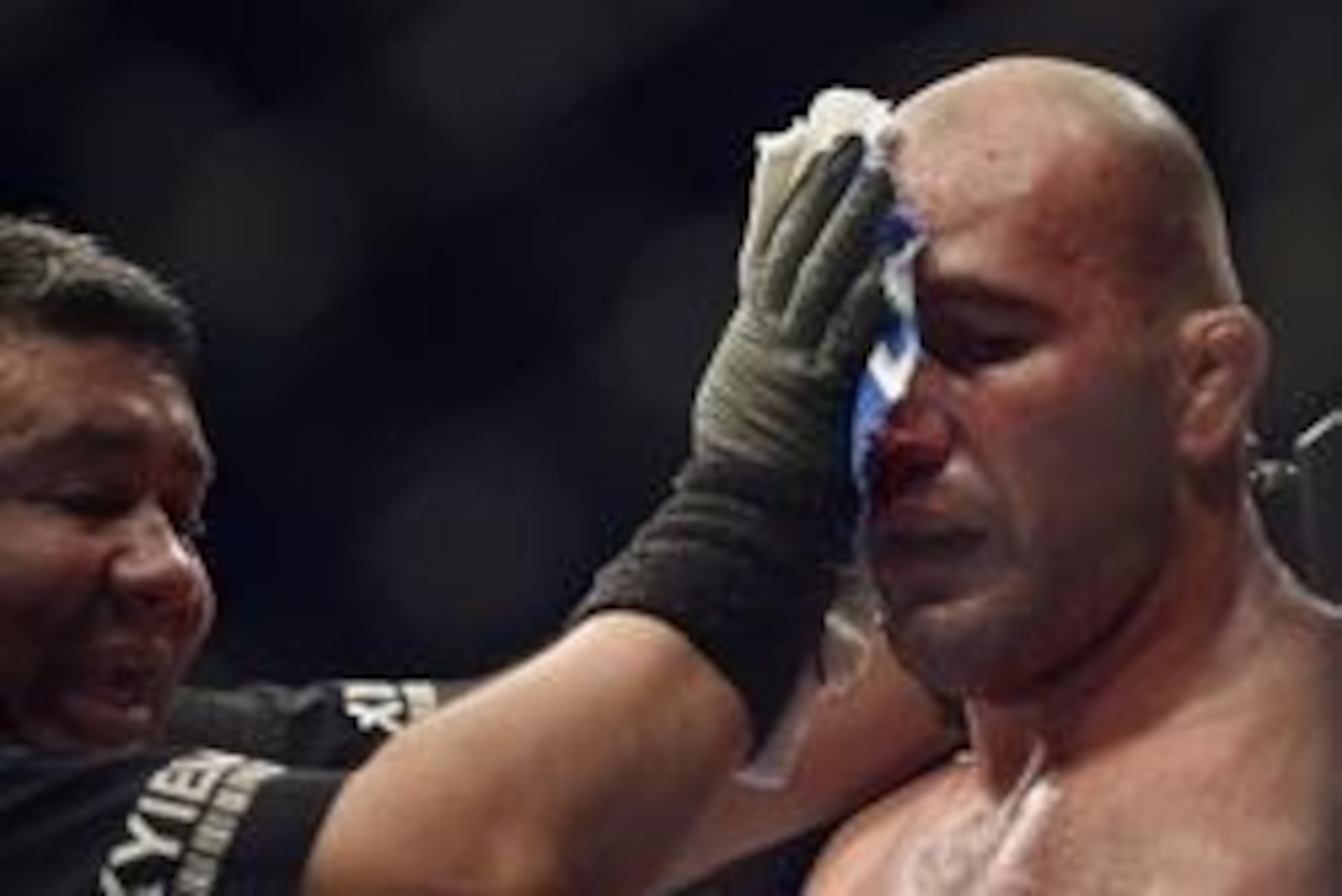 Apr 26, 2014; Baltimore, MD, USA; Medical staff attend to a cut above the eye of Glover Teixeira during the UFC light heavy weight championship fight against Jon Jones at Baltimore Arena. Jones retained the light heavy height championship by defeating Apr 26, 2014; Baltimore, MD, USA; Medical staff attend to a cut above the eye of Glover Teixeira during the UFC light heavy weight championship fight against Jon Jones at Baltimore Arena. Jones retained the light heavy height championship by defeating