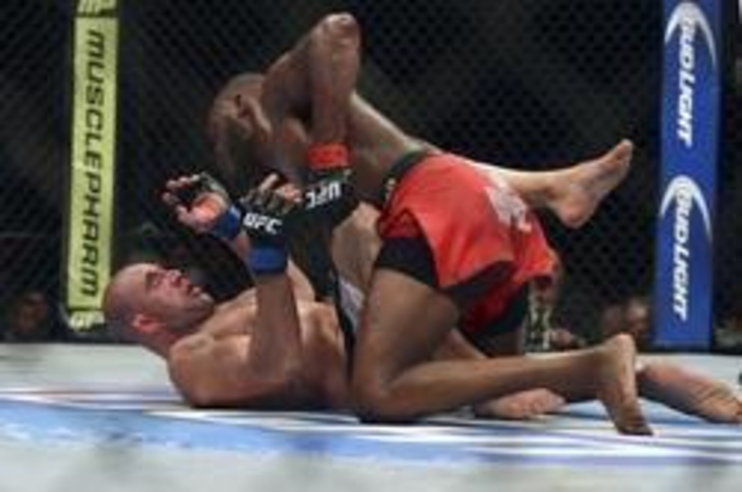 Apr 26, 2014; Baltimore, MD, USA; Jon Jones (top) punches Glover Teixeira during the UFC light heavy weight championship fight at Baltimore Arena. Jones retained the light heavy height championship by defeating Teixeria. Mandatory Credit: Tommy Gillig Apr 26, 2014; Baltimore, MD, USA; Jon Jones (top) punches Glover Teixeira during the UFC light heavy weight championship fight at Baltimore Arena. Jones retained the light heavy height championship by defeating Teixeria. Mandatory Credit: Tommy Gillig