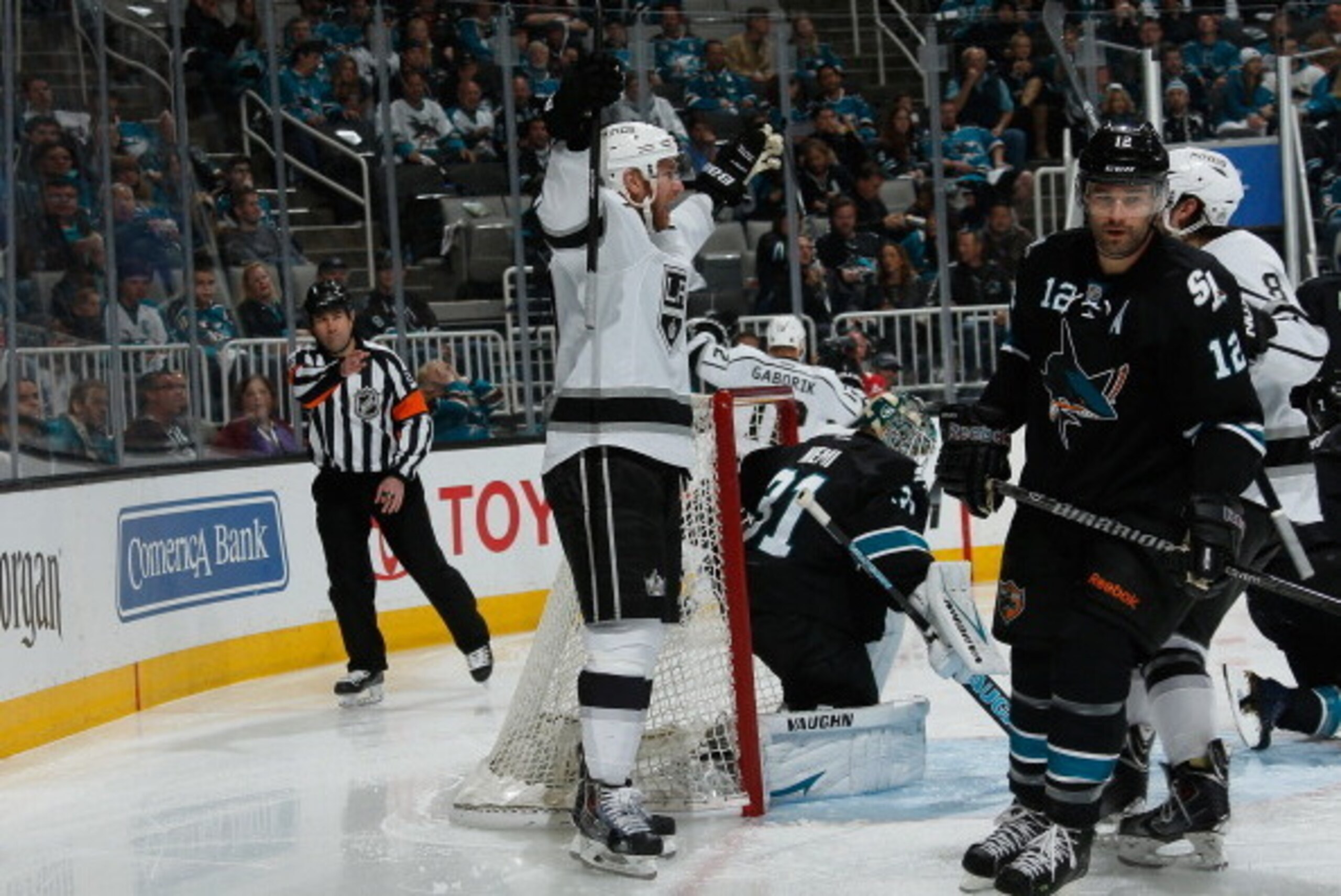 SAN JOSE, CA - APRIL 26: Jeff Carter #77 of the Los Angeles Kings celebrates a goal against Patrick Marleau #12 and Antti Niemi #31 of the San Jose Sharks in Game Five of the First Round of the 2014 Stanley Cup Playoffs at SAP Center on April 26, 2014 in SAN JOSE, CA - APRIL 26: Jeff Carter #77 of the Los Angeles Kings celebrates a goal against Patrick Marleau #12 and Antti Niemi #31 of the San Jose Sharks in Game Five of the First Round of the 2014 Stanley Cup Playoffs at SAP Center on April 26, 2014 in