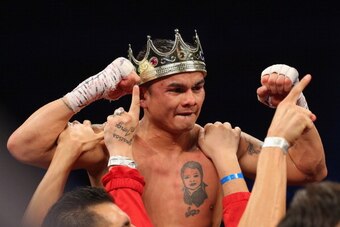 SAN ANTONIO, TX - DECEMBER 14:  Marcos Maidana celebrates his unanimous decision against Adrien Broner becoming the new WBA Welterweight Title champion at Alamodome on December14, 2013 in San Antonio, Texas.during their bout at Alamodome on December 14, 2