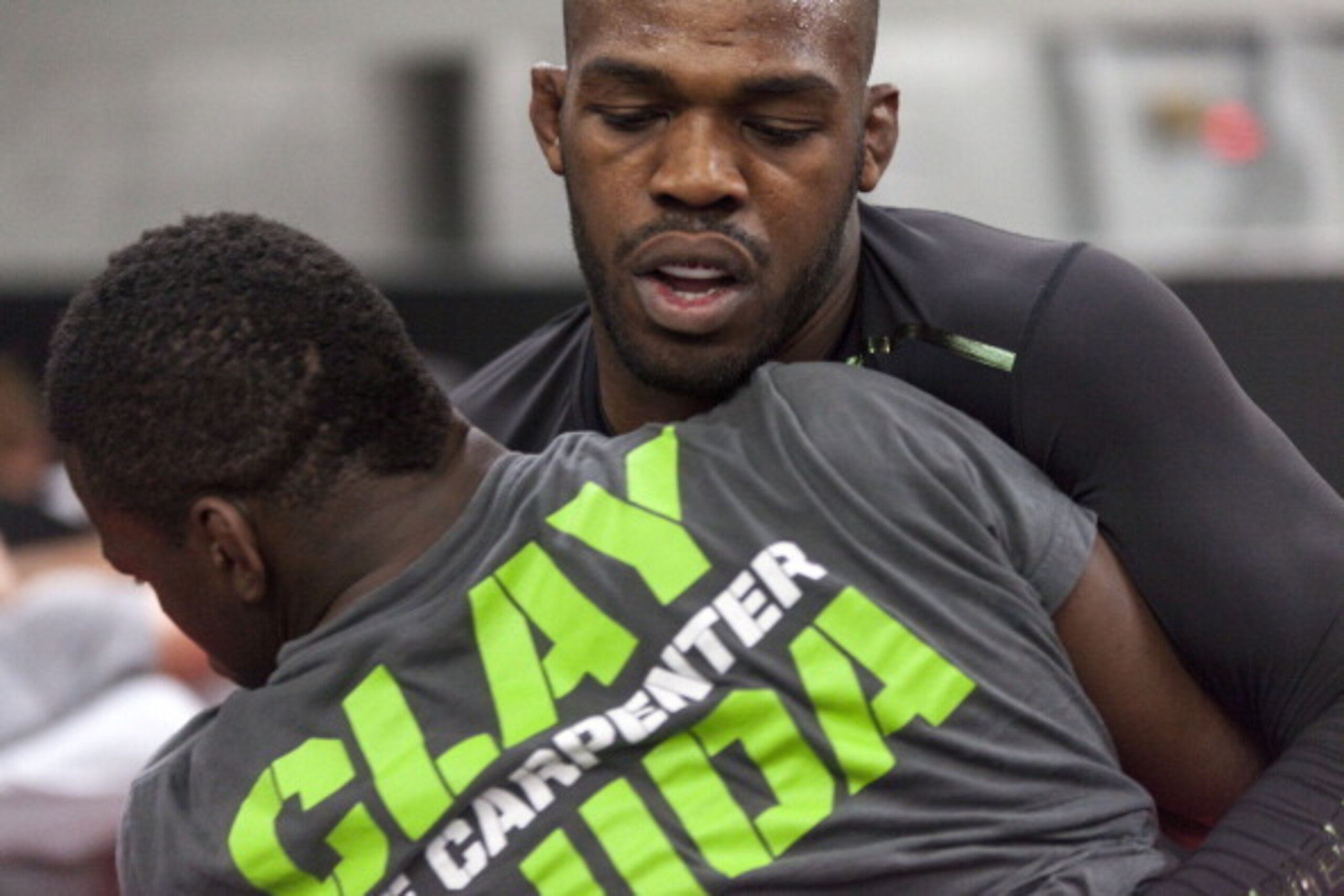 ALBUQUERQUE, NM - APRIL 2: UFC lightweight champion Jon 'Bones' Jones joins in for a warm up during an open training session for fans and media at the Jackson's Mixed Martial Arts and Fitness on April 2, 2014 in Albuquerque, New Mexico. (Photo by Aaron Sw
