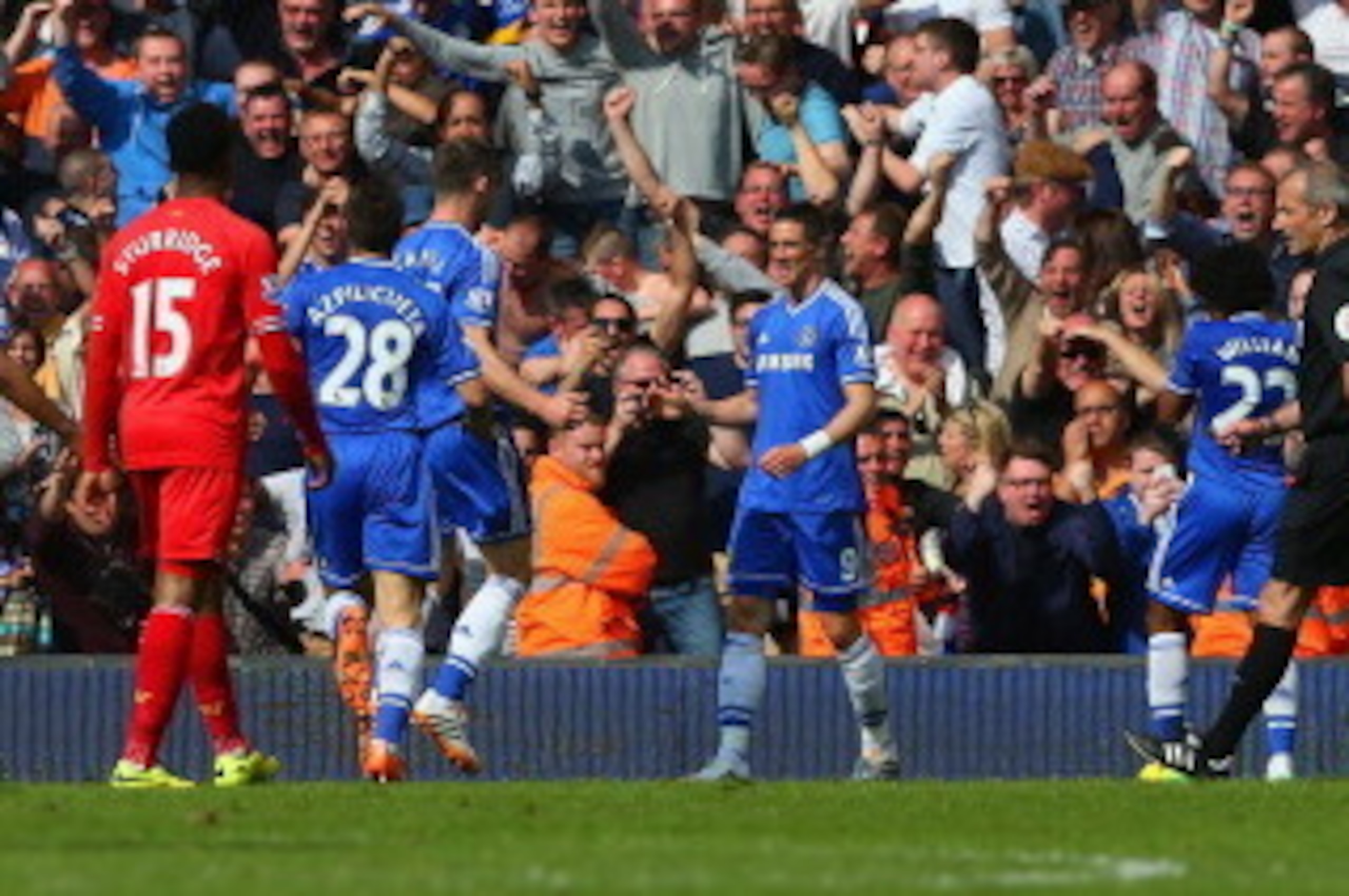 LIVERPOOL, ENGLAND - APRIL 27:  Goalscorer Willian , Fernando Torres and Gary Cahill of Chelsea celebrate in front of the Chelsea fans after the second goal during the Barclays Premier League match between Liverpool and Chelsea at Anfield on April 27, 201