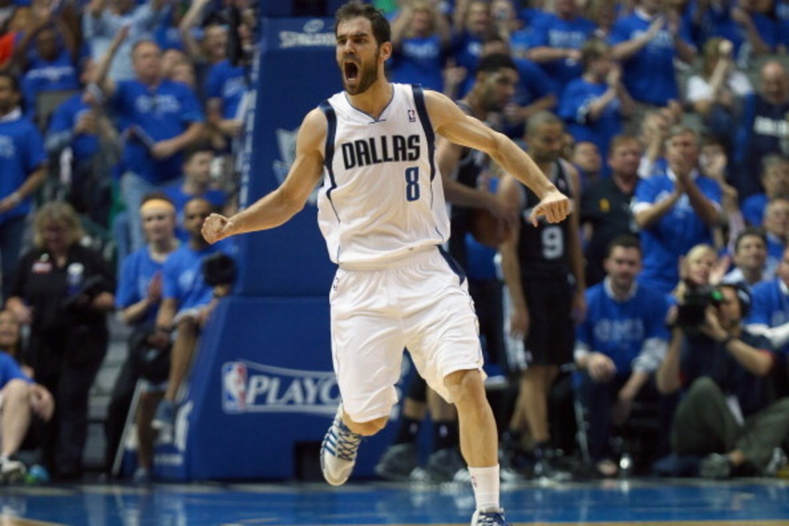DALLAS, TX - APRIL 26:  Jose Calderon #8 of the Dallas Mavericks celebrates against the San Antonio Spurs during Game Three of the Western Conference Quarterfinals during the 2014 NBA Playoffs at American Airlines Center on April 26, 2014 in Dallas, Texas