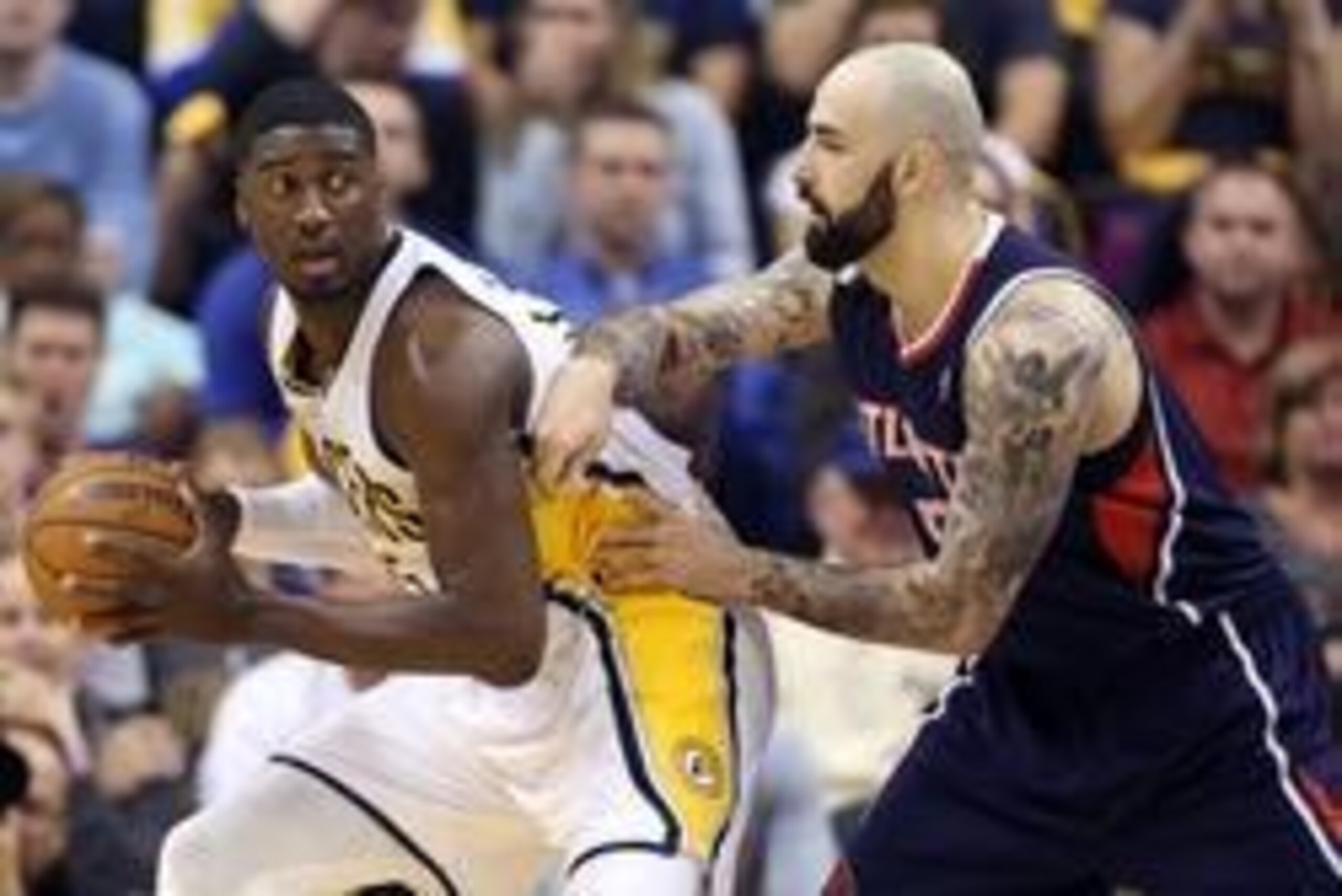 Apr 22, 2014; Indianapolis, IN, USA; Indiana Pacers center Roy Hibbert (55) posts up against Atlanta Hawks center Pero Antic (6) in game two during the first round of the 2014 NBA Playoffs at Bankers Life Fieldhouse. Mandatory Credit: Brian Spurlock-USA T