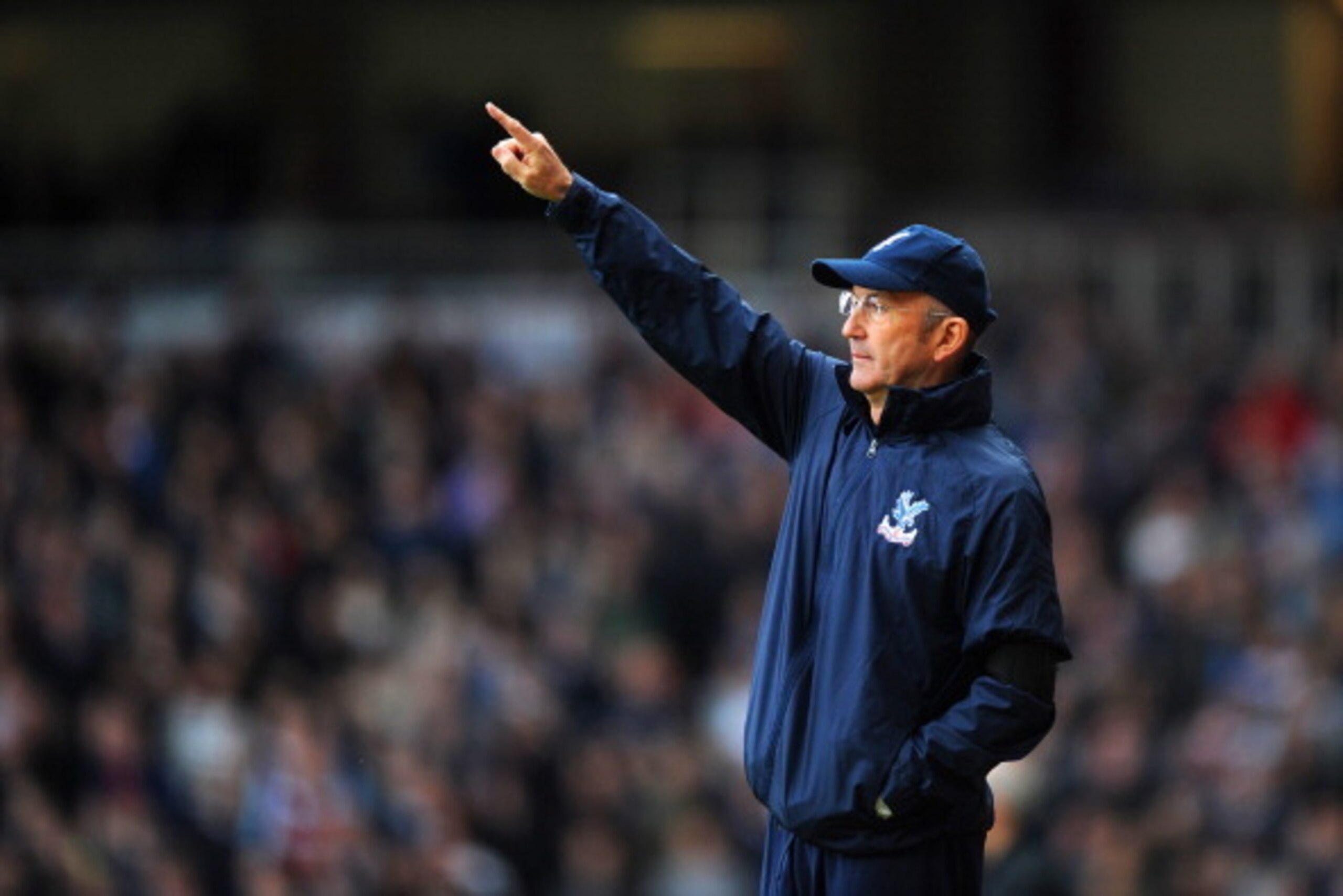 LONDON, ENGLAND - APRIL 19:  Tony Pulis manager of Crystal Palace points during the Barclays Premier League match between West Ham United and Crystal Palace at Boleyn Ground on April 19, 2014 in London, England.  (Photo by Steve Bardens/Getty Images)