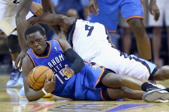 MEMPHIS, TN - APRIL 26:  Reggie Jackson #15 of the Oklahoma City Thunder grabs a loose ball during the game against the Memphis Grizzlies in Game 4 of the Western Conference Quarterfinals during the 2014 NBA Playoffs at FedExForum on April 26, 2014 in Mem