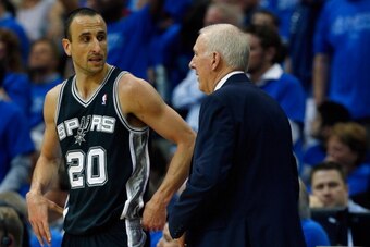 DALLAS, TX - APRIL 26:   Manu Ginobili #20 of the San Antonio Spurs talks with Gregg Popovich of the San Antonio Spurs during Game Three of the Western Conference Quarterfinals during the 2014 NBA Playoffs at American Airlines Center on April 26, 2014 in 