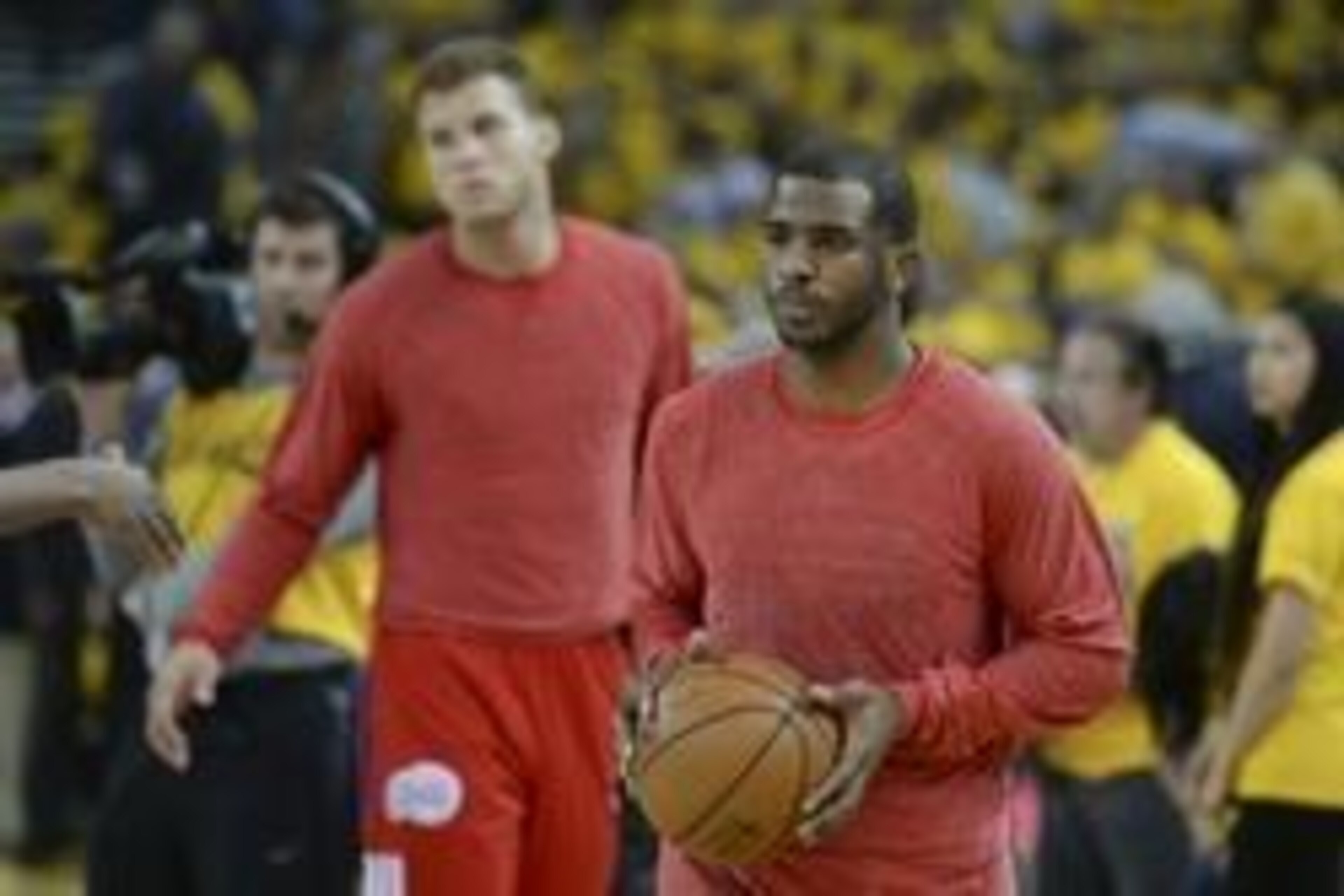 Apr 27, 2014; Oakland, CA, USA; Los Angeles Clippers guard Chris Paul (3, right) and forward Blake Griffin (32, left) warm up before game four of the first round of the 2014 NBA Playoffs against the Golden State Warriors at Oracle Arena. Mandatory Credit: