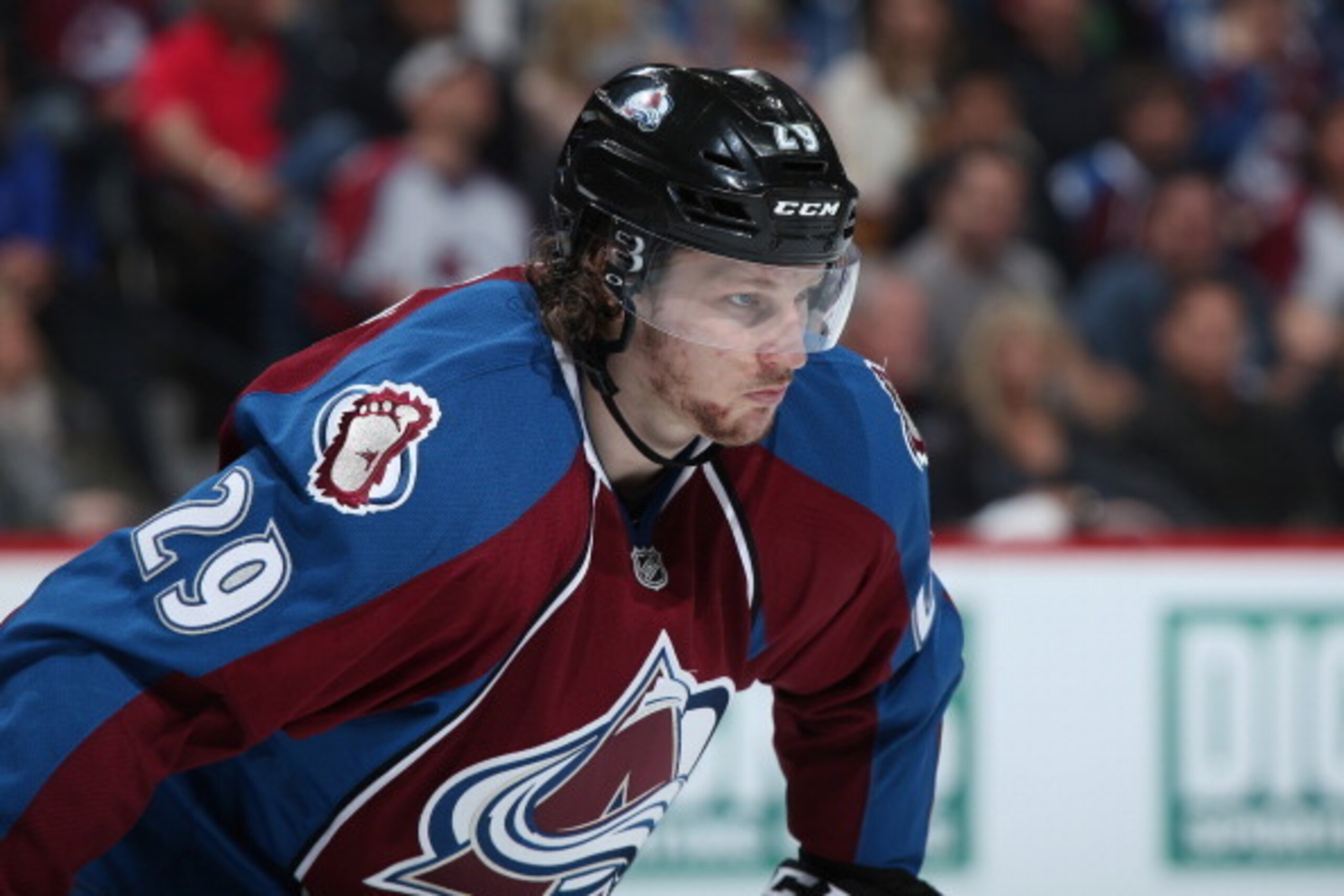 DENVER, CO - APRIL 26:  Nathan MacKinnon #29 of the Colorado Avalanche looks on during a break in the action as he went on to score the game winning goal against the Minnesota Wild Game Five of the First Round of the 2014 NHL Stanley Cup Playoffs at Pepsi