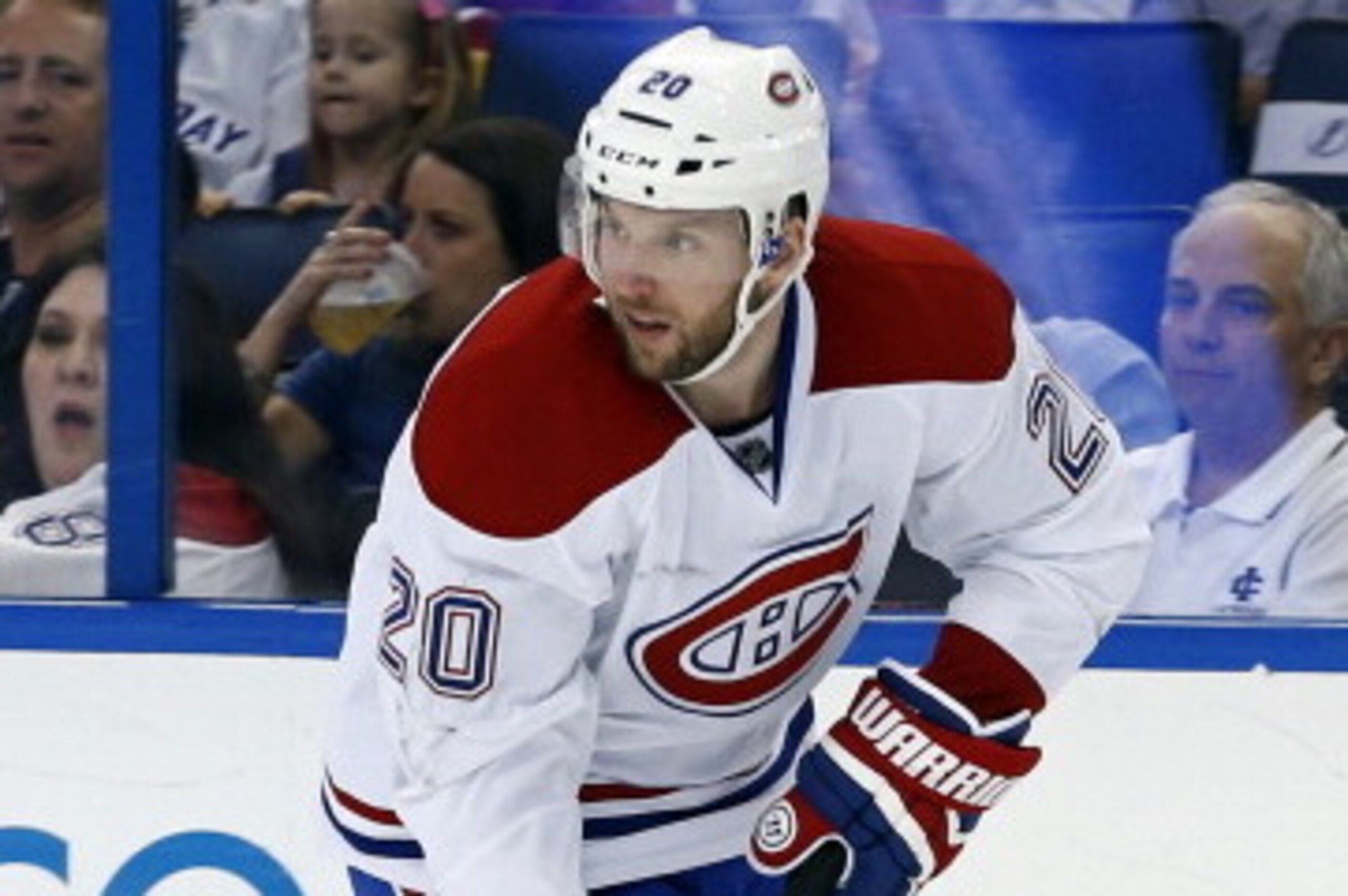 TAMPA, FL - APRIL 1:  Thomas Vanek #20 of the Montreal Canadiens brings the puck up against the Tampa Bay Lightning at the Tampa Bay Times Forum on April 1, 2014 in Tampa, Florida.  (Photo by Mike Carlson/Getty Images)