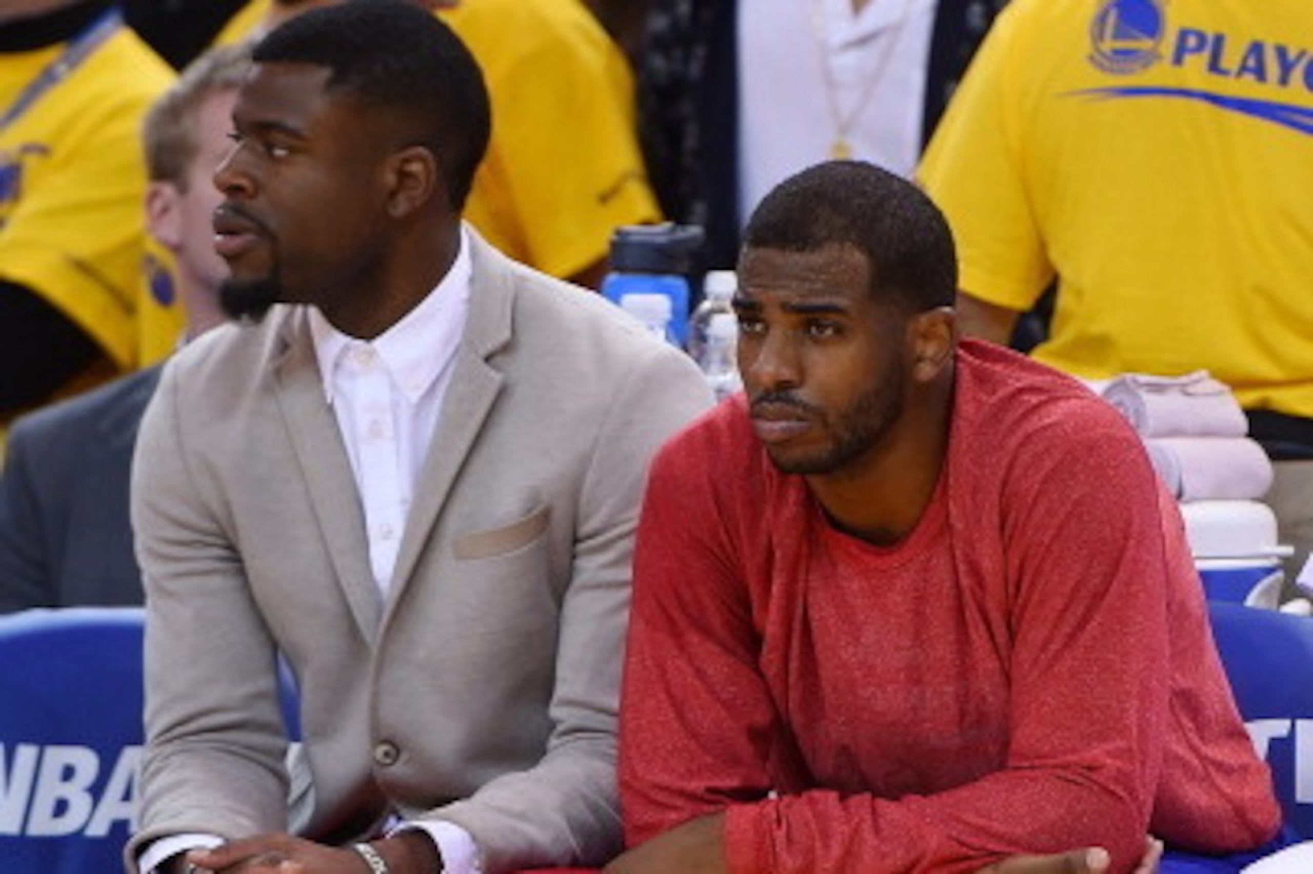 OAKLAND, CA - APRIL 27:  Chris Paul #3 of the Los Angeles Clippers sits on the bench wearing his warm-up top inside out against the Golden State Warriors in Game Four of the Western Conference Quarterfinals during the 2014 NBA Playoffs at ORACLE Arena on 