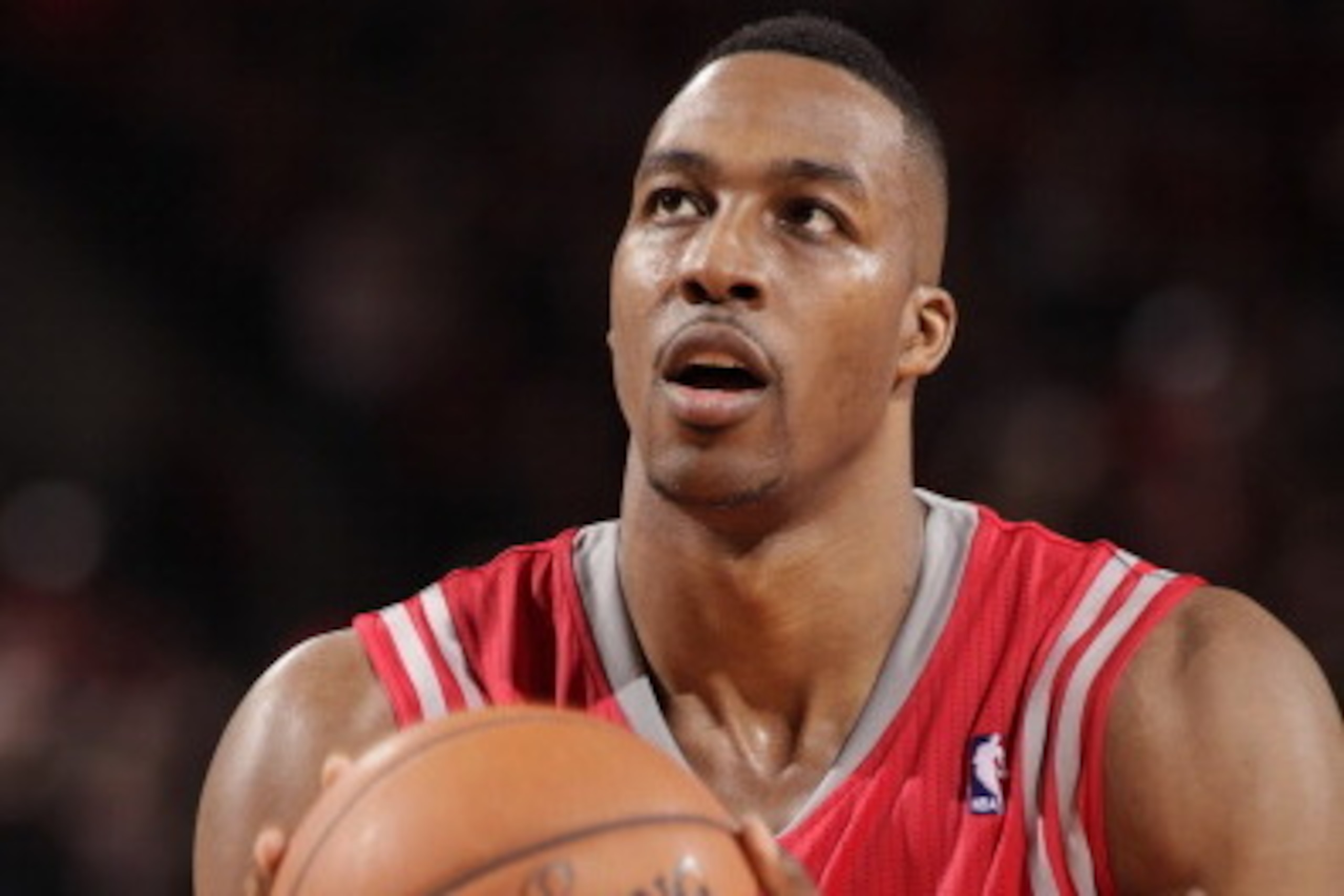 PORTLAND, OR - APRIL 25: Dwight Howard #12 of the Houston Rockets attempts a free throw against the Portland Trail Blazers in Game Three of the Western Conference Quarterfinals during the 2014 NBA Playoffs on April 25, 2014 at the Moda Center in Portland,