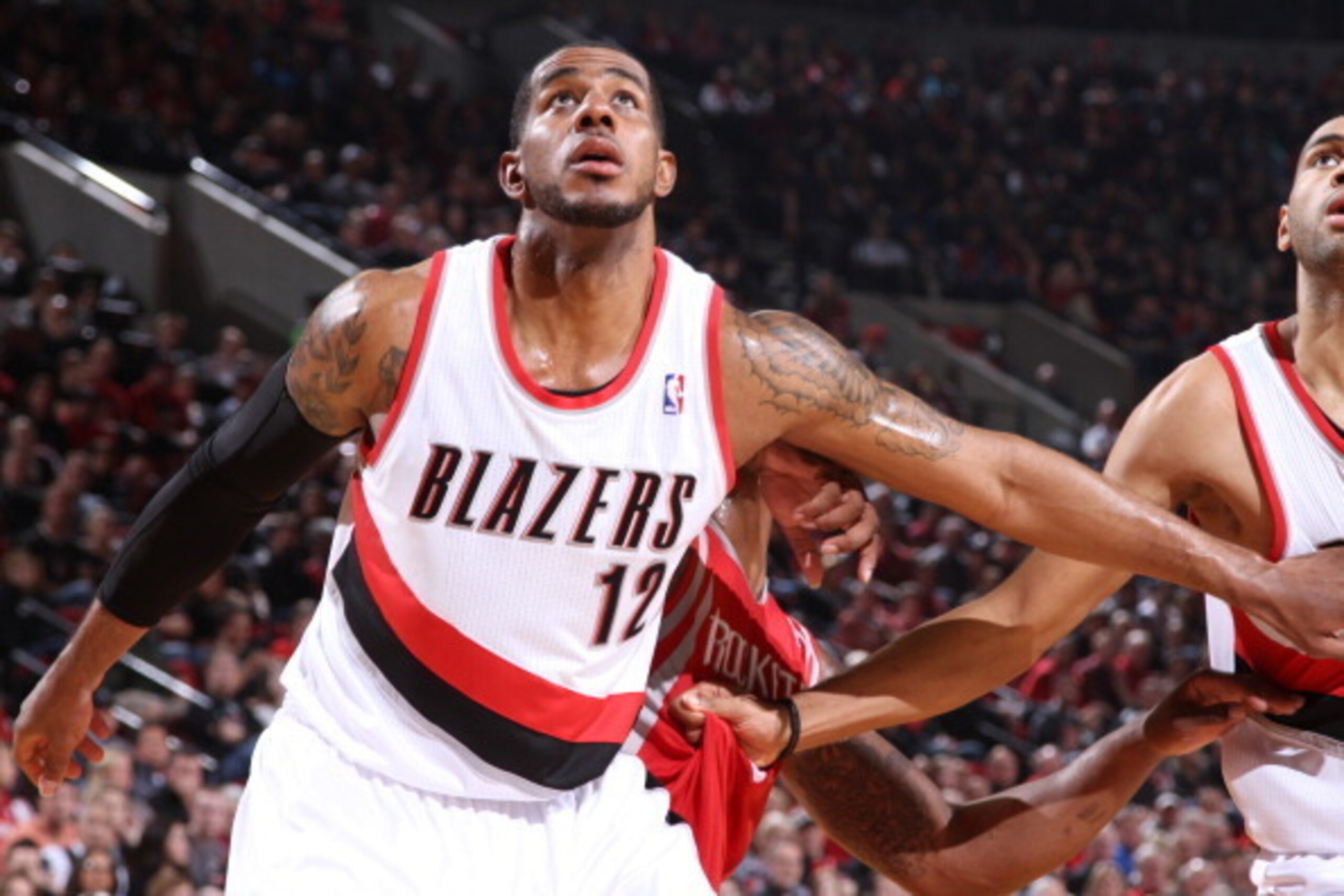 PORTLAND, OR - APRIL 27: LaMarcus Aldridge #12 of the Portland Trail Blazers battles for position against the Houston Rockets in Game Four of the Western Conference Quarterfinals during the 2014 NBA Playoffs on April 27, 2014 at the Moda Center in Portlan
