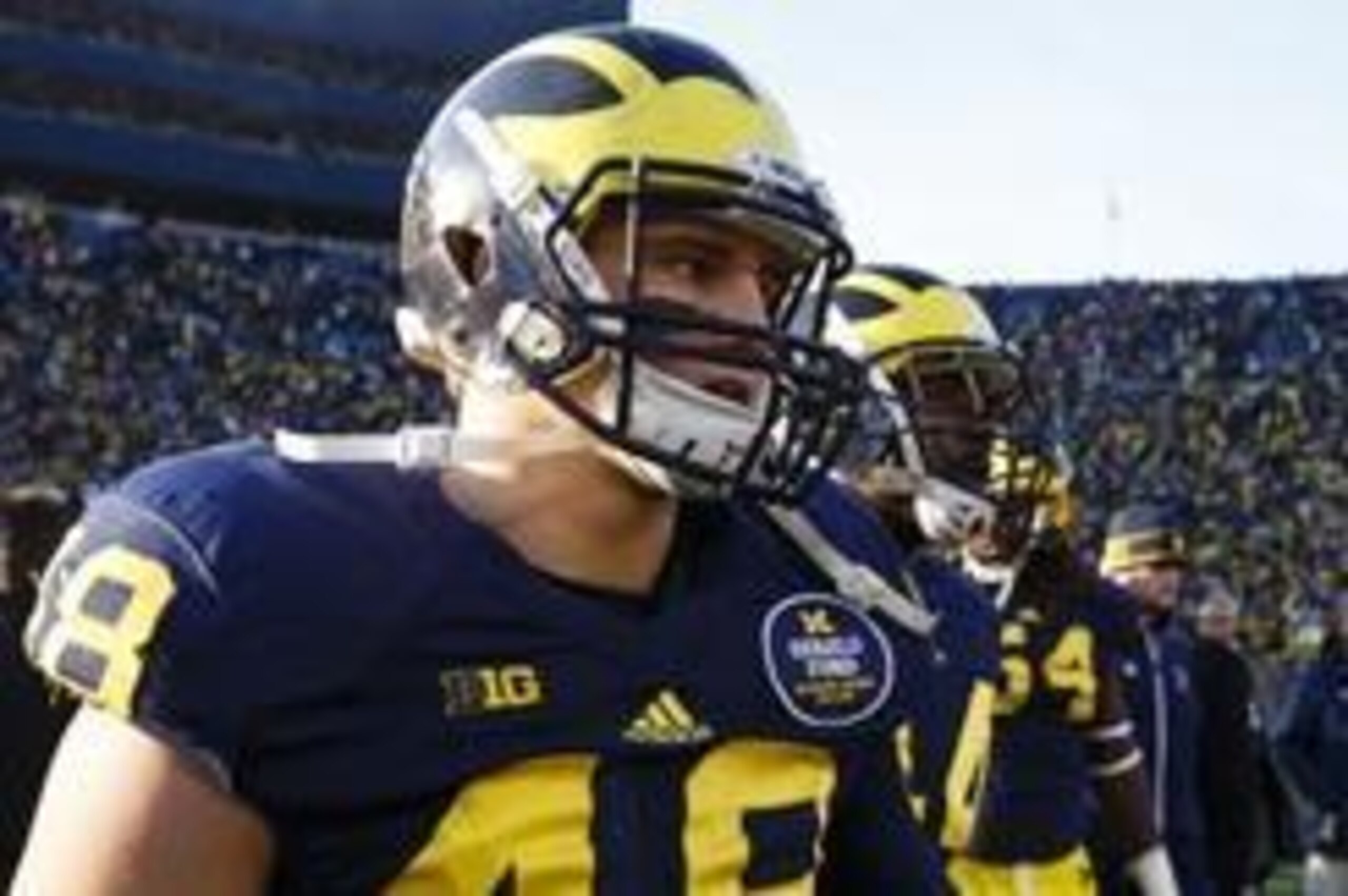 Nov 30, 2013; Ann Arbor, MI, USA; Michigan Wolverines linebacker Desmond Morgan (48) walks off the field after the game against the Ohio State Buckeyes at Michigan Stadium. Ohio State won 42-41. Mandatory Credit: Rick Osentoski-USA TODAY Sports Nov 30, 2013; Ann Arbor, MI, USA; Michigan Wolverines linebacker Desmond Morgan (48) walks off the field after the game against the Ohio State Buckeyes at Michigan Stadium. Ohio State won 42-41. Mandatory Credit: Rick Osentoski-USA TODAY Sports