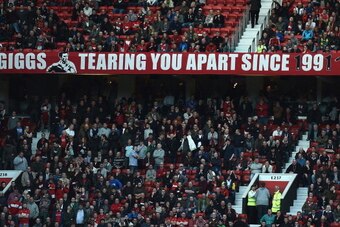 MANCHESTER, ENGLAND - APRIL 26:  A banner showing support of Ryan Giggs during the Barclays Premier League match between Manchester United and Norwich City at Old Trafford on April 26, 2014 in Manchester, England.  (Photo by Laurence Griffiths/Getty Image