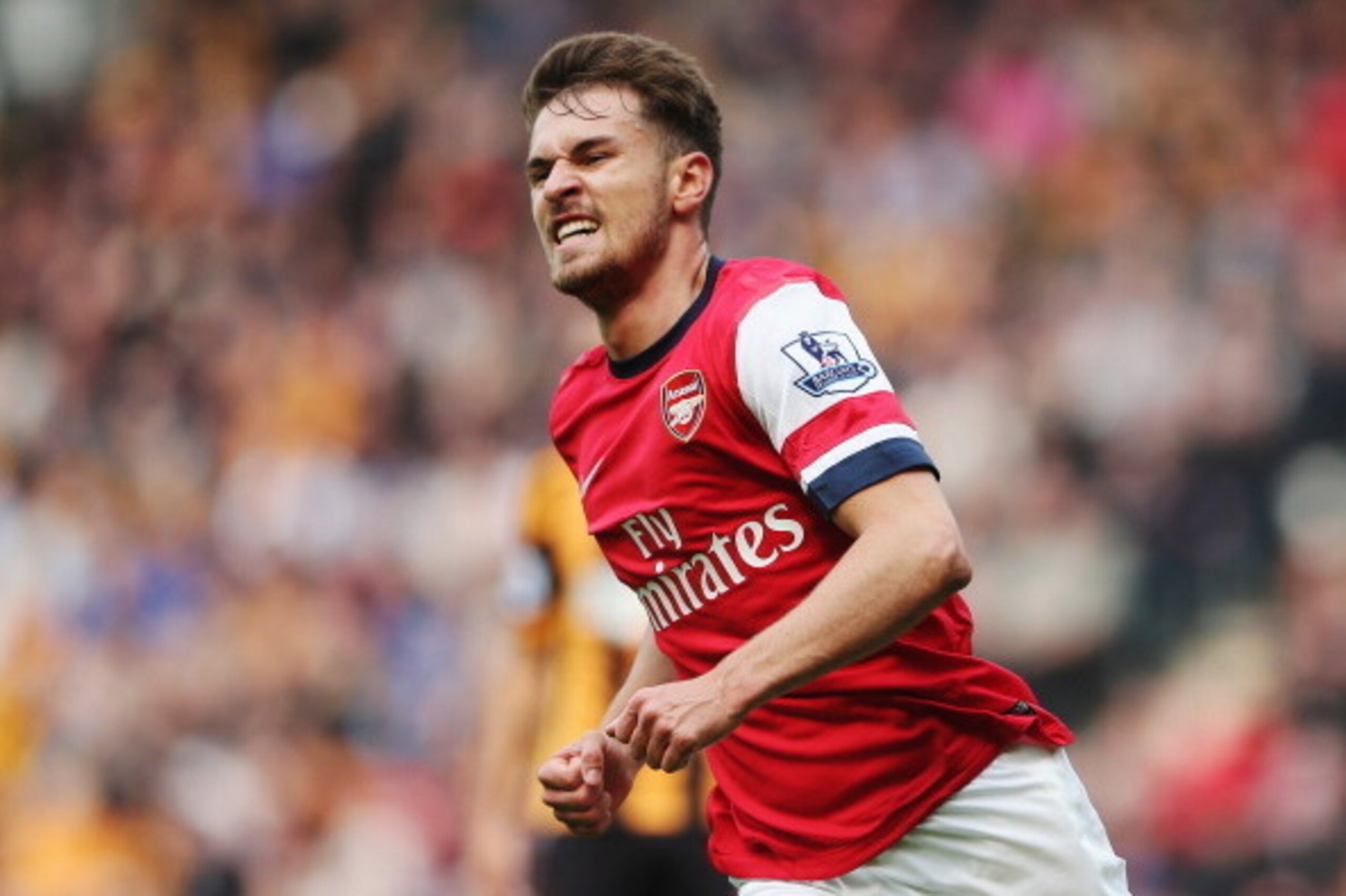 HULL, ENGLAND - APRIL 20:  Aaron Ramsey of Arsenal celebrates scoring his sides first goal during the Barclays Premier League match between Hull City and Arsenal at KC Stadium on April 20, 2014 in Hull, England.  (Photo by Scott Heavey/Getty Images)