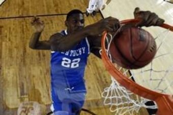 Apr 7, 2014; Arlington, TX, USA; Kentucky Wildcats forward Alex Poythress (22) dunks the ball during the first half against the Connecticut Huskies during the championship game of the Final Four in the 2014 NCAA Mens Division I Championship tournament at 