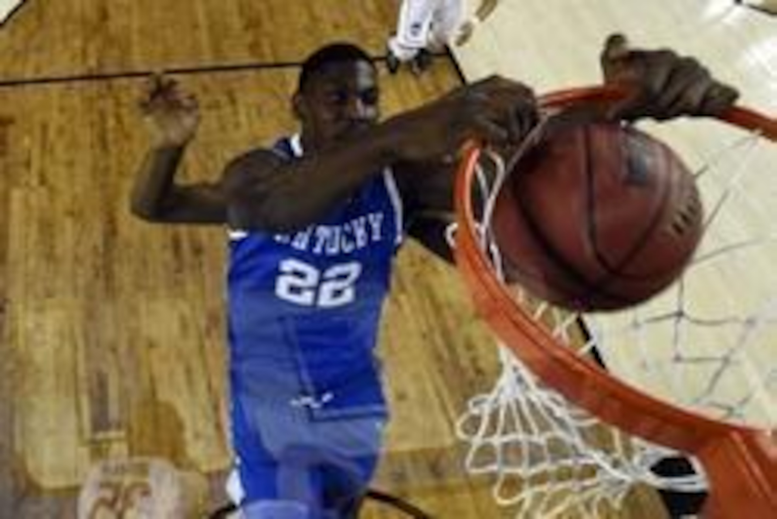 Apr 7, 2014; Arlington, TX, USA; Kentucky Wildcats forward Alex Poythress (22) dunks the ball during the first half against the Connecticut Huskies during the championship game of the Final Four in the 2014 NCAA Mens Division I Championship tournament at 