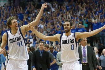 DALLAS, TX - APRIL 26:  Dirk Nowitzki #41 of the Dallas Mavericks and Jose Calderon #8 of the Dallas Mavericks celebrate after the Dallas Mavericks beat the San Antonio Spurs 109-108 during Game Three of the Western Conference Quarterfinals during the 201
