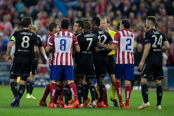 MADRID, SPAIN - APRIL 22: Gabi Fernandez of Atletico de Madrid touches the neck of Cesar Azpilicueta of Chelsea FC during the UEFA Champions League Semi Final first leg match between Club Atletico de Madrid and Chelsea FC at Vicente Calderon Stadium on Ap