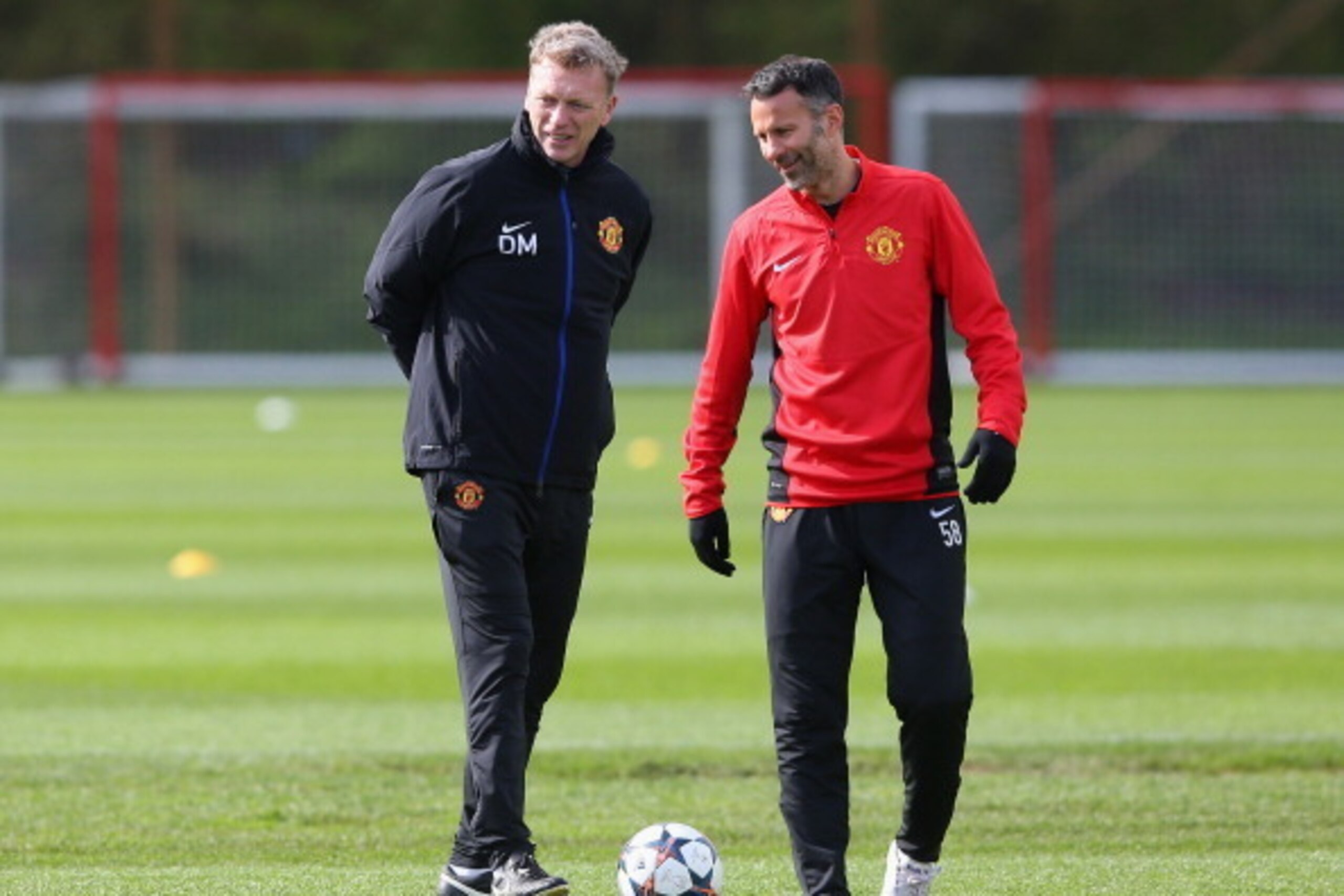 MANCHESTER, ENGLAND - APRIL 08:  David Moyes the manager of Manchester United and Ryan Giggs look on during a training session at Aon Training Complex on April 8, 2014 in Manchester, England.  (Photo by Alex Livesey/Getty Images)