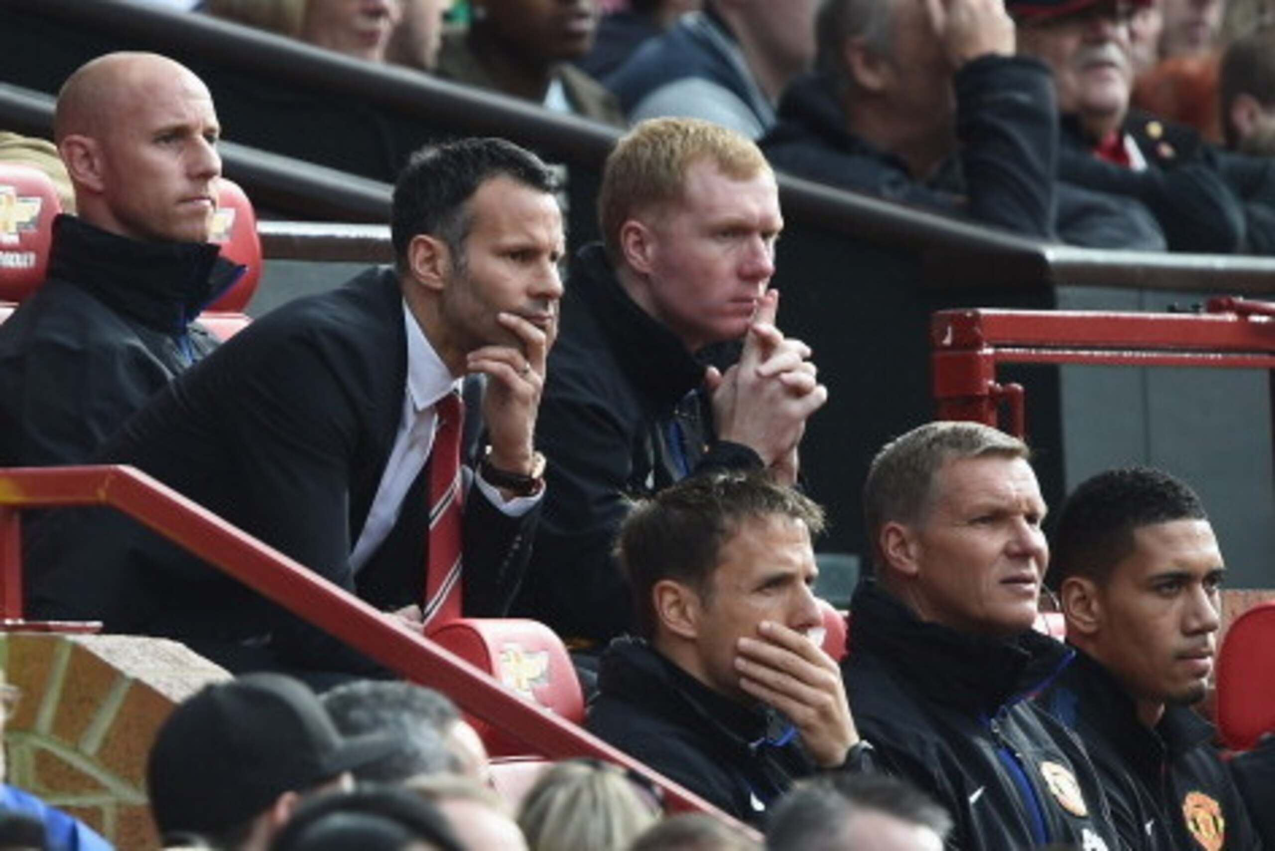 MANCHESTER, ENGLAND - APRIL 26:  Ryan Giggs of Manchester United looks on from the dug out during the Barclays Premier League match between Manchester United and Norwich City at Old Trafford on April 26, 2014 in Manchester, England.  (Photo by Laurence Gr