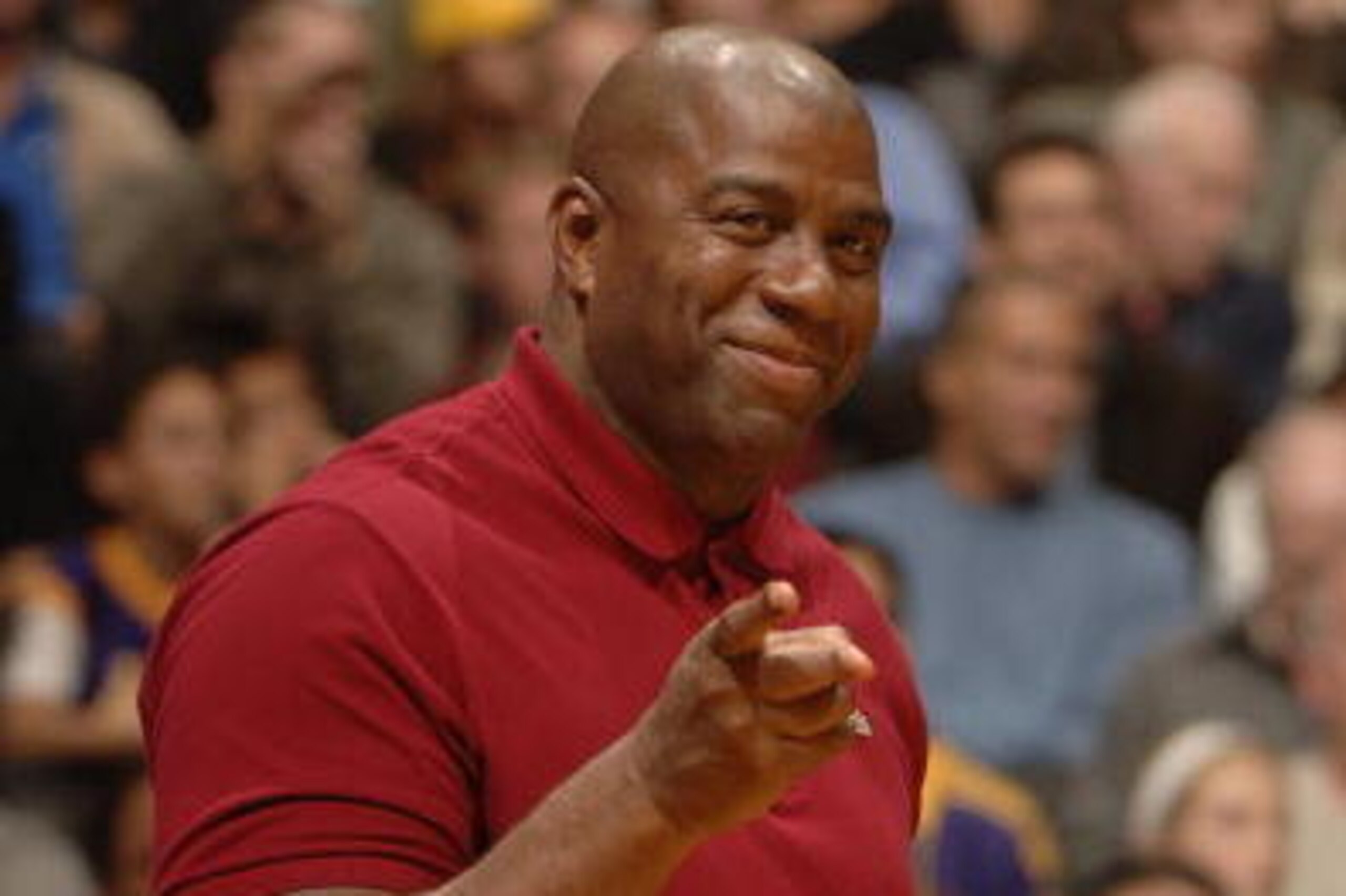 LOS ANGELES - NOVEMBER 21:  Former NBA great Earvin 'Magic' Johnson sits courtside as the Los Angeles Lakers play against the Los Angeles Clippers November 21, 2006 at Staples Center in Los Angeles, California.  NOTE TO USER: User expressly acknowledges a