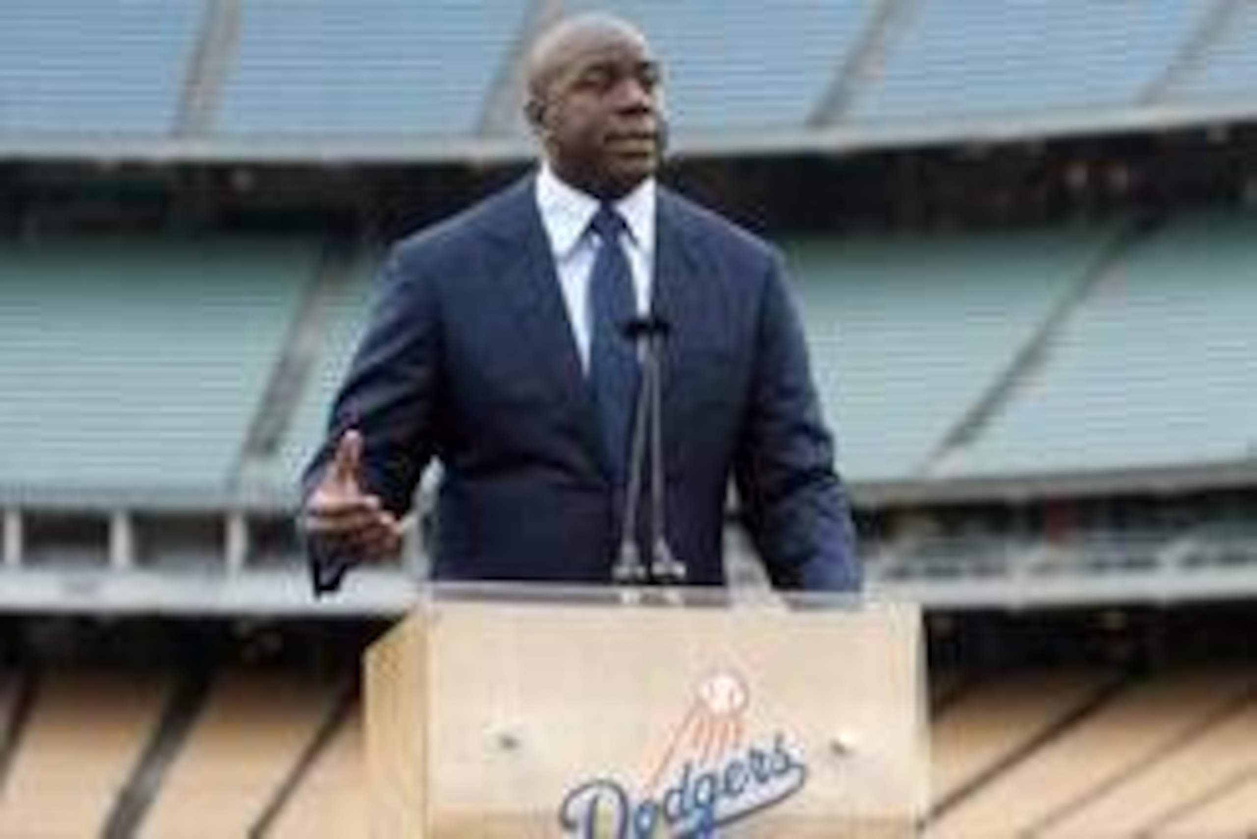 May 2, 2012; Los Angeles, CA, USA; Magic Johnson speaks at a press conference to announce the sale of the Los Angeles Dodgers to the Guggenheim baseball management team at Dodger Stadium. Mandatory Credit: Kirby Lee/Image of Sport-USA TODAY Sports