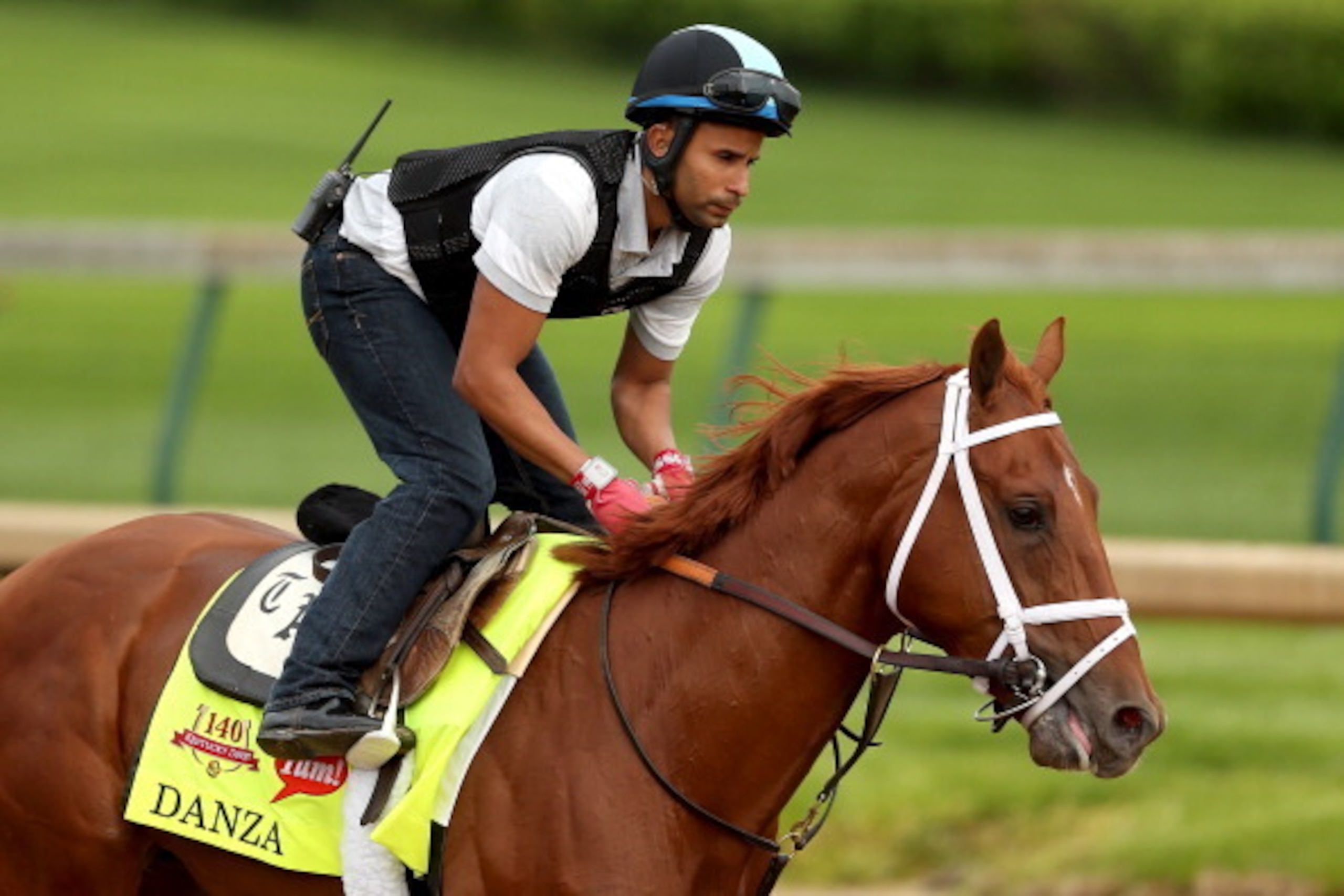 LOUISVILLE, KY - APRIL 25:  Danza is riden by Ezekiel Perez during the morning exercise session in preparation for the 140th Kentucky Derby at Churchill Downs on April 25, 2014 in Louisville, Kentucky.  (Photo by Matthew Stockman/Getty Images)