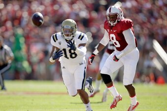 PALO ALTO, CA - OCTOBER 19:  Thomas Duarte #18 of the UCLA Bruins can not catch a pass while defened by Jordan Richards #8 of the Stanford Cardinal at Stanford Stadium on October 19, 2013 in Palo Alto, California.  (Photo by Ezra Shaw/Getty Images)