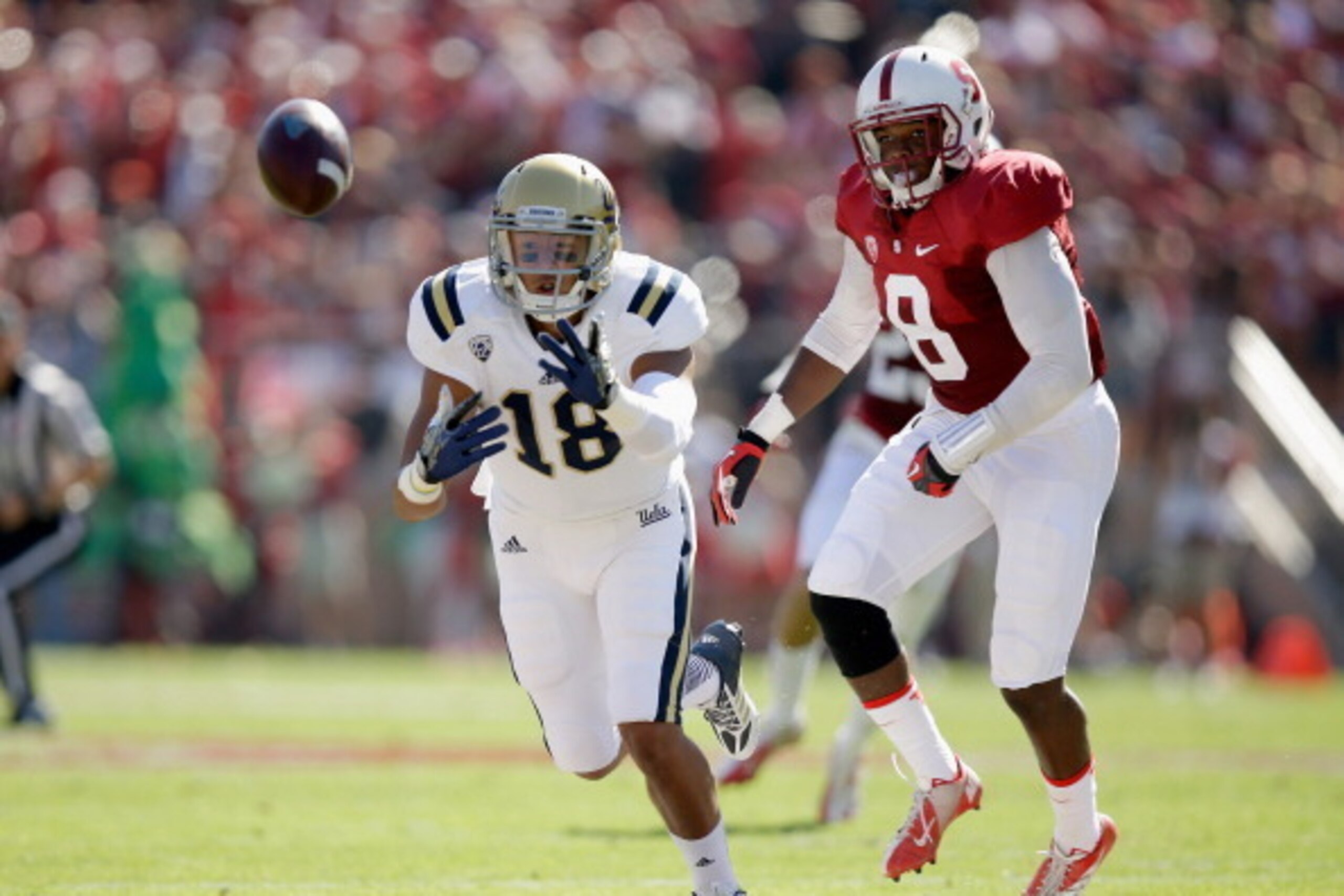 PALO ALTO, CA - OCTOBER 19:  Thomas Duarte #18 of the UCLA Bruins can not catch a pass while defened by Jordan Richards #8 of the Stanford Cardinal at Stanford Stadium on October 19, 2013 in Palo Alto, California.  (Photo by Ezra Shaw/Getty Images)
